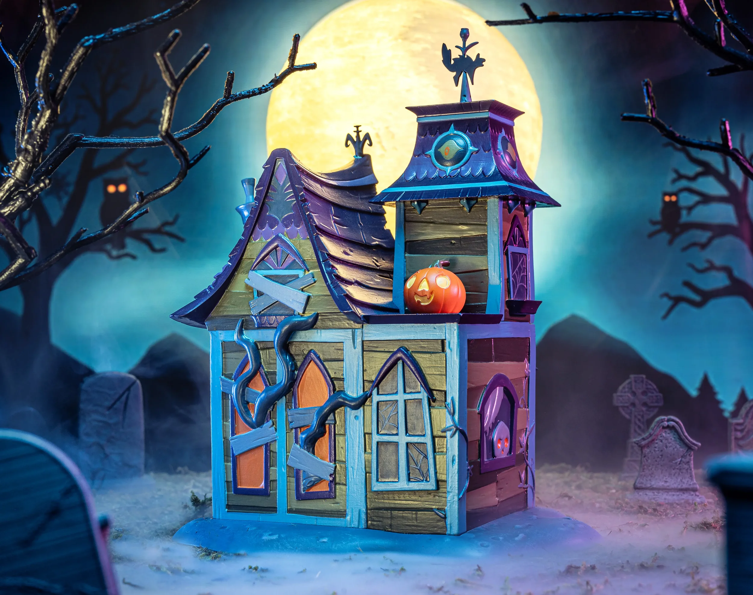 Stephanie Buscema Black Cat Chateau resin haunted house art toy, rear view showing gothic windows, vines, and pumpkin on balcony