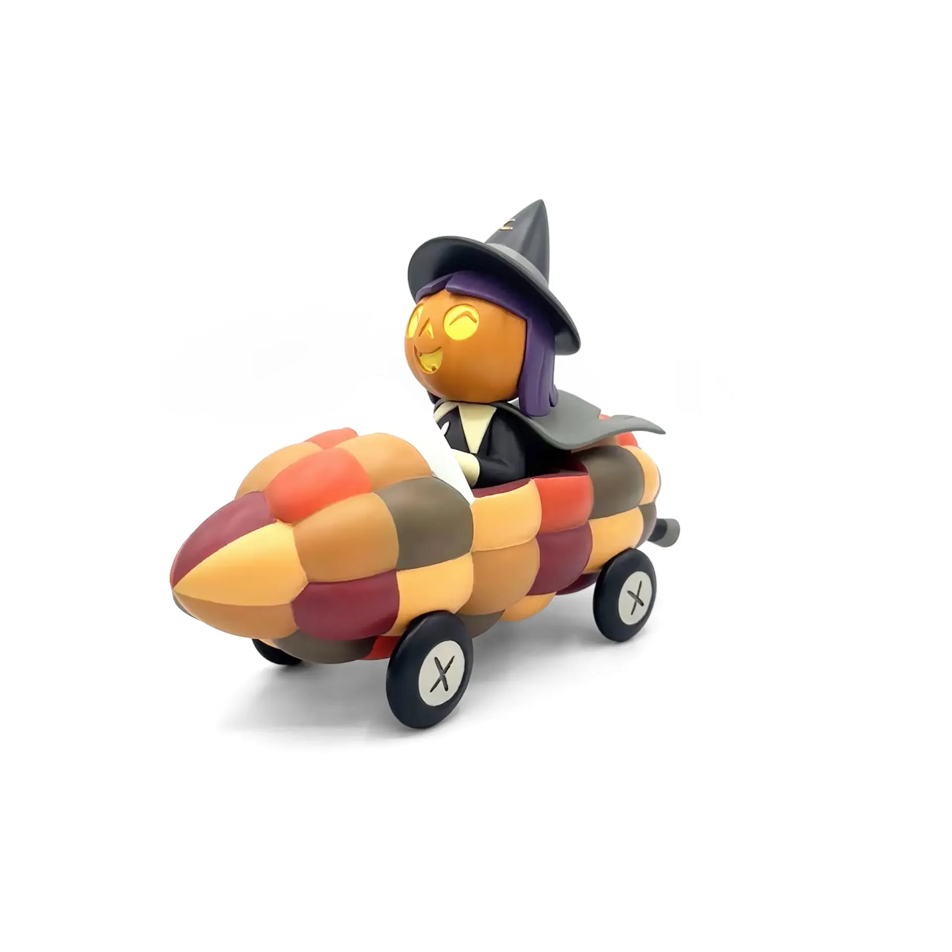 Stephanie Buscema Willa the Way-Out Witch in her Corn Cob Cruiser, three-quarter front view from right showing patchwork