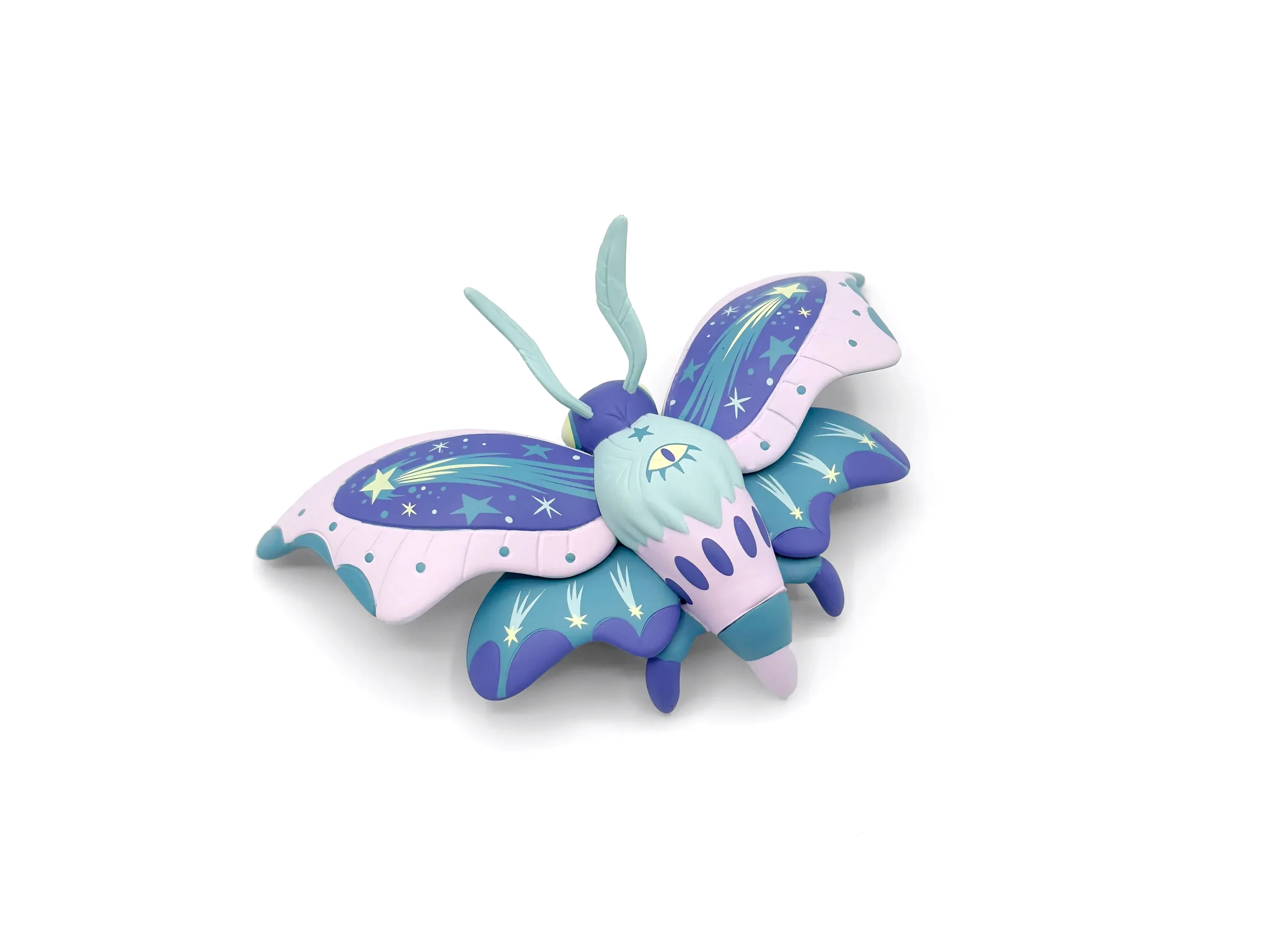 Stephanie Buscema Astroptera Stelle vinyl moth art toy, elevated three-quarter view showing star pattern across all four wings