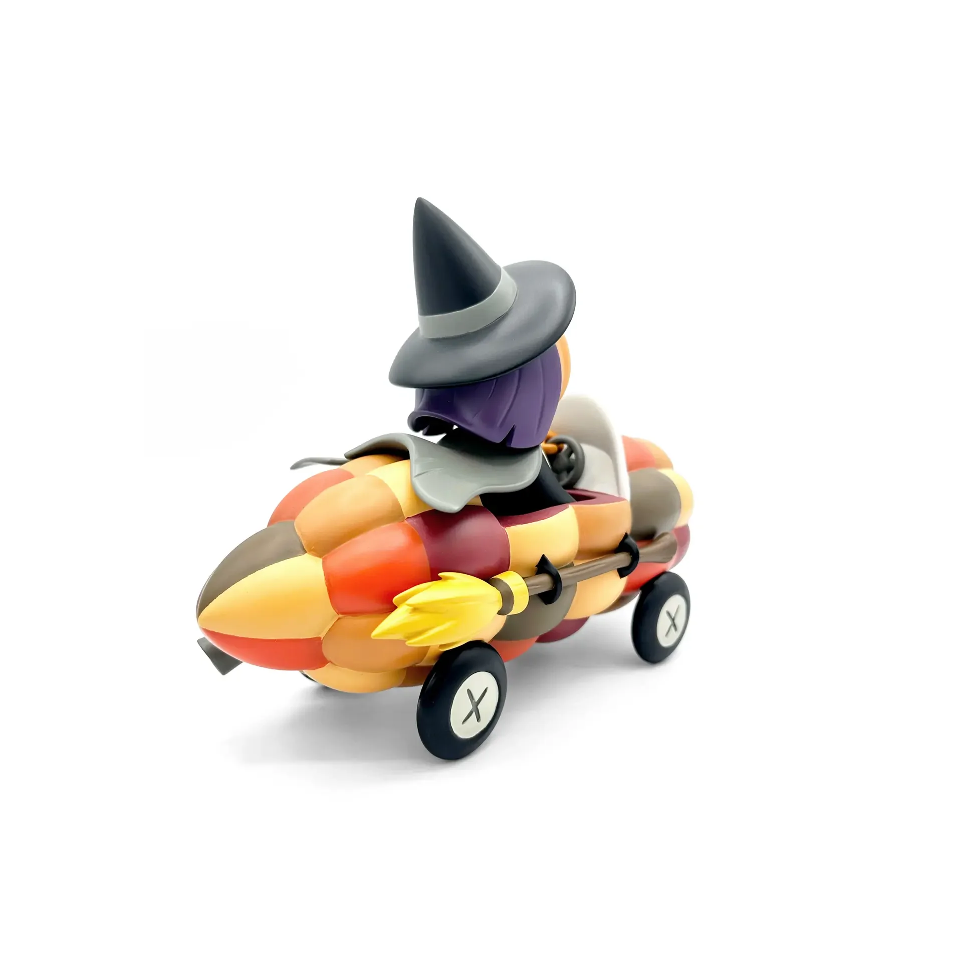 Stephanie Buscema Willa the Way-Out Witch Corny Cruisers resin art toy, three-quarter rear view with broom and tail fin