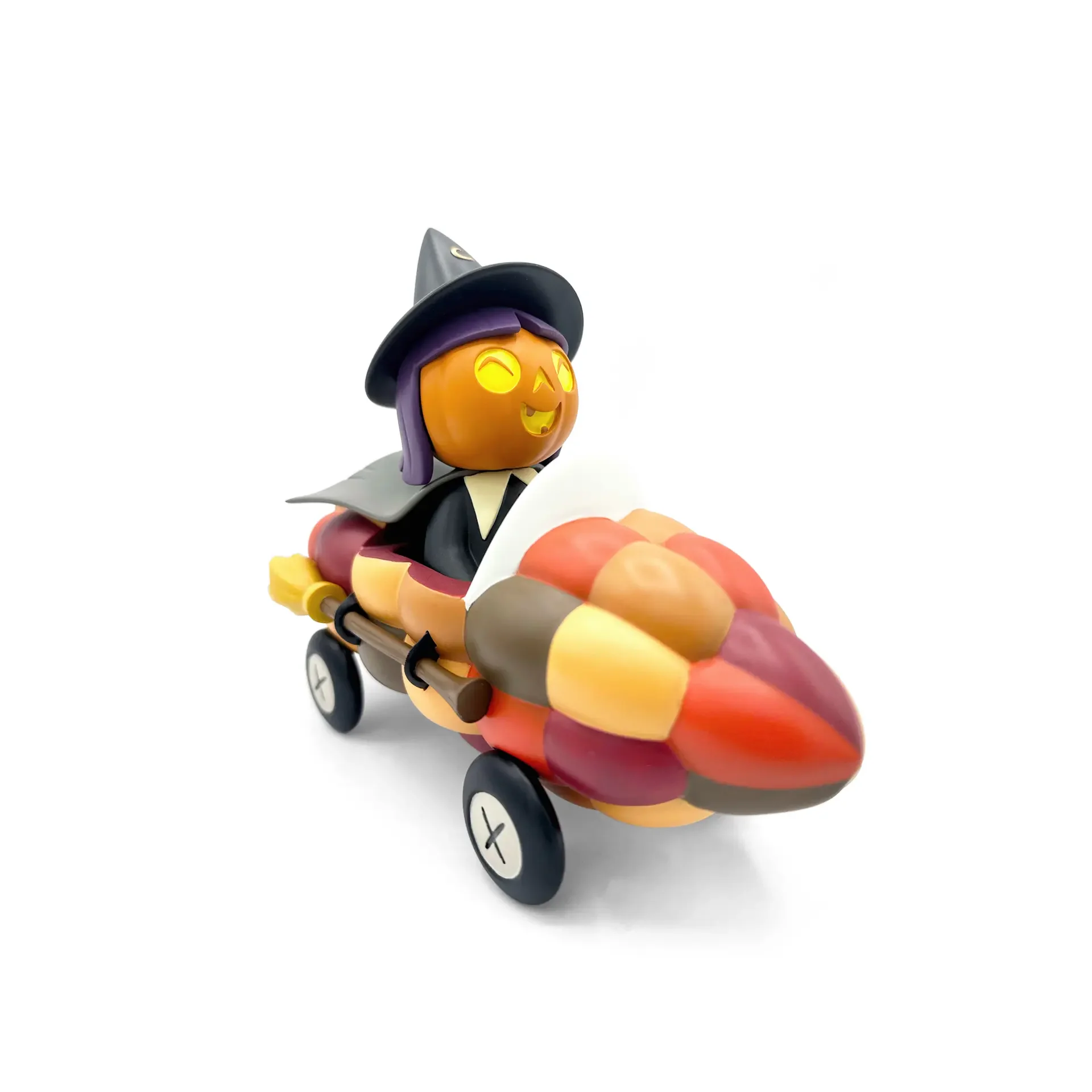 Stephanie Buscema Willa the Way-Out Witch in her Corn Cob Cruiser, three-quarter front view from left with broom detail