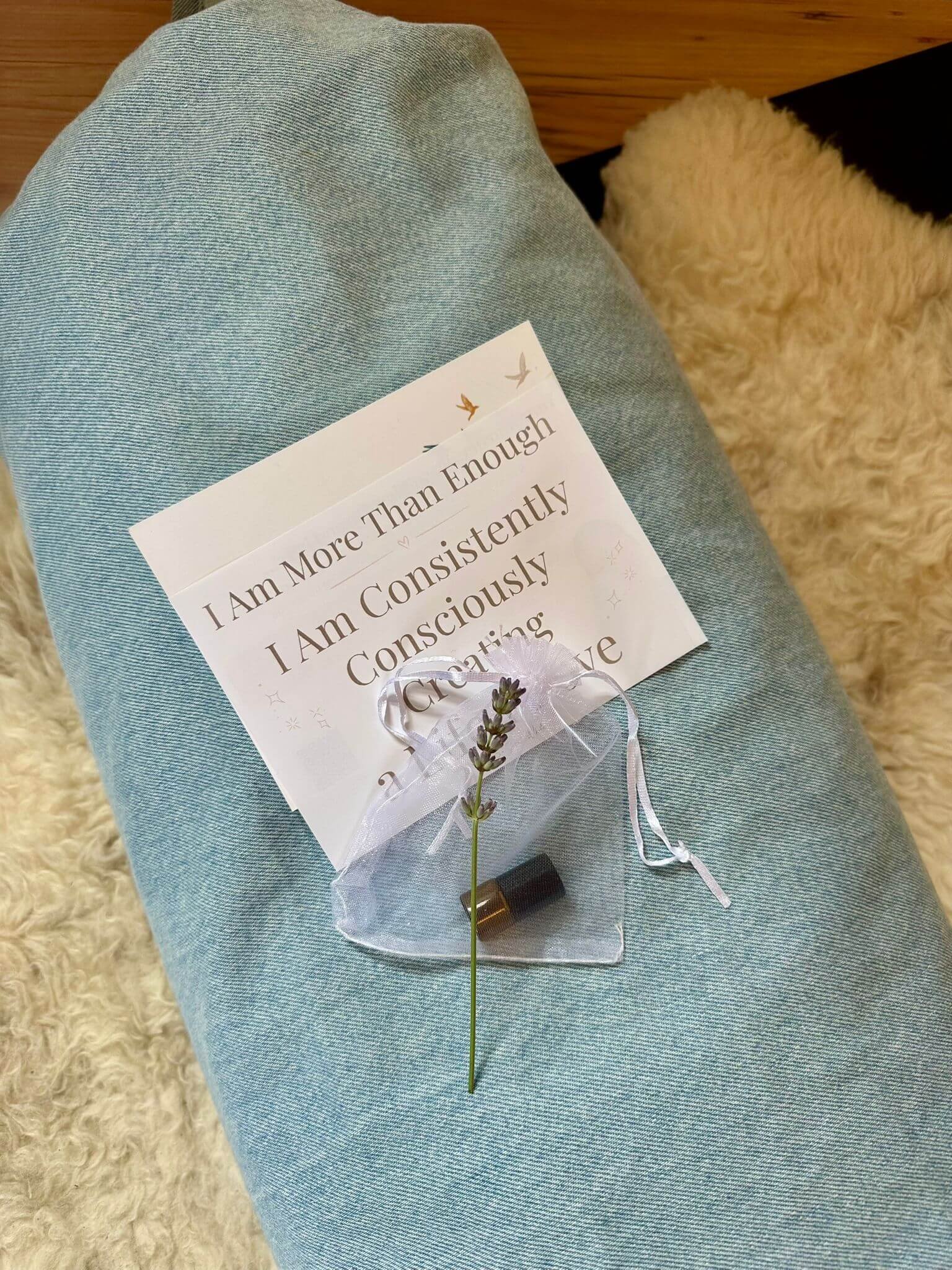 A piece of lavender and a sign on a bolster