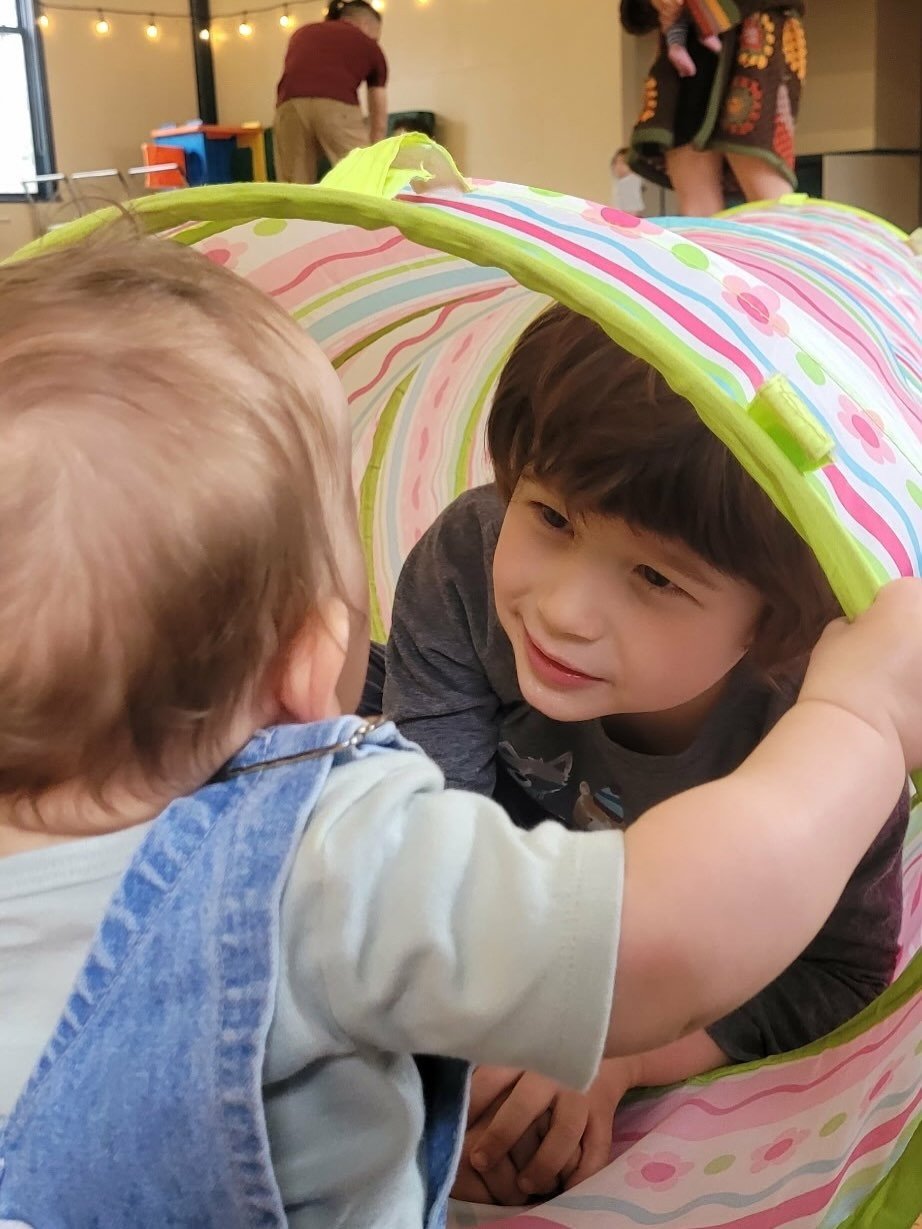 Tom and littles tube play connection (1).jpg