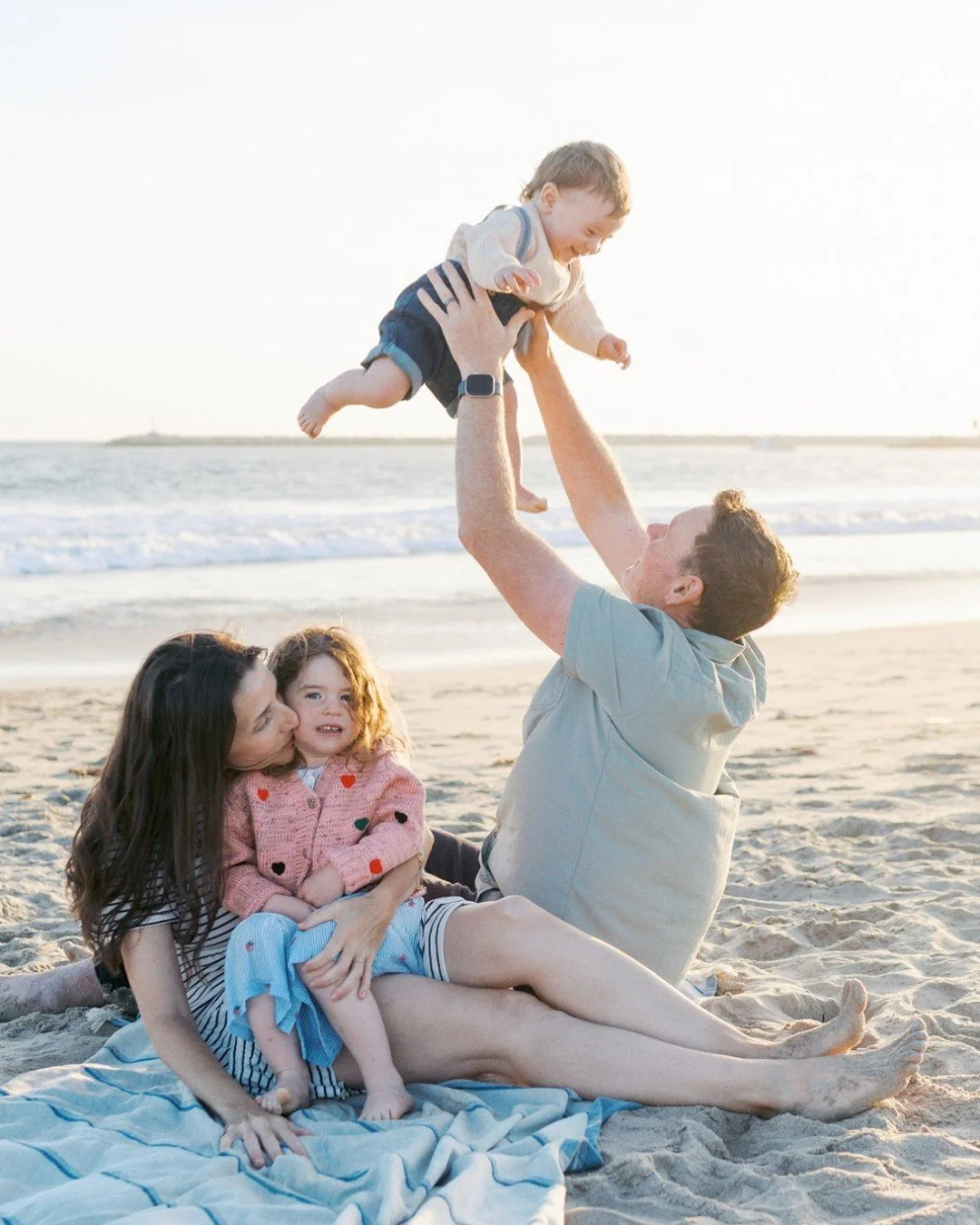 Some of my favorite photographs happen in the moments that weren't really planned.

The walk to the next spot.
The way your child reaches for your hand.
Someone making everyone laugh.
Windblown hair, sandy feet, a kid who has absolutely had enough. ?