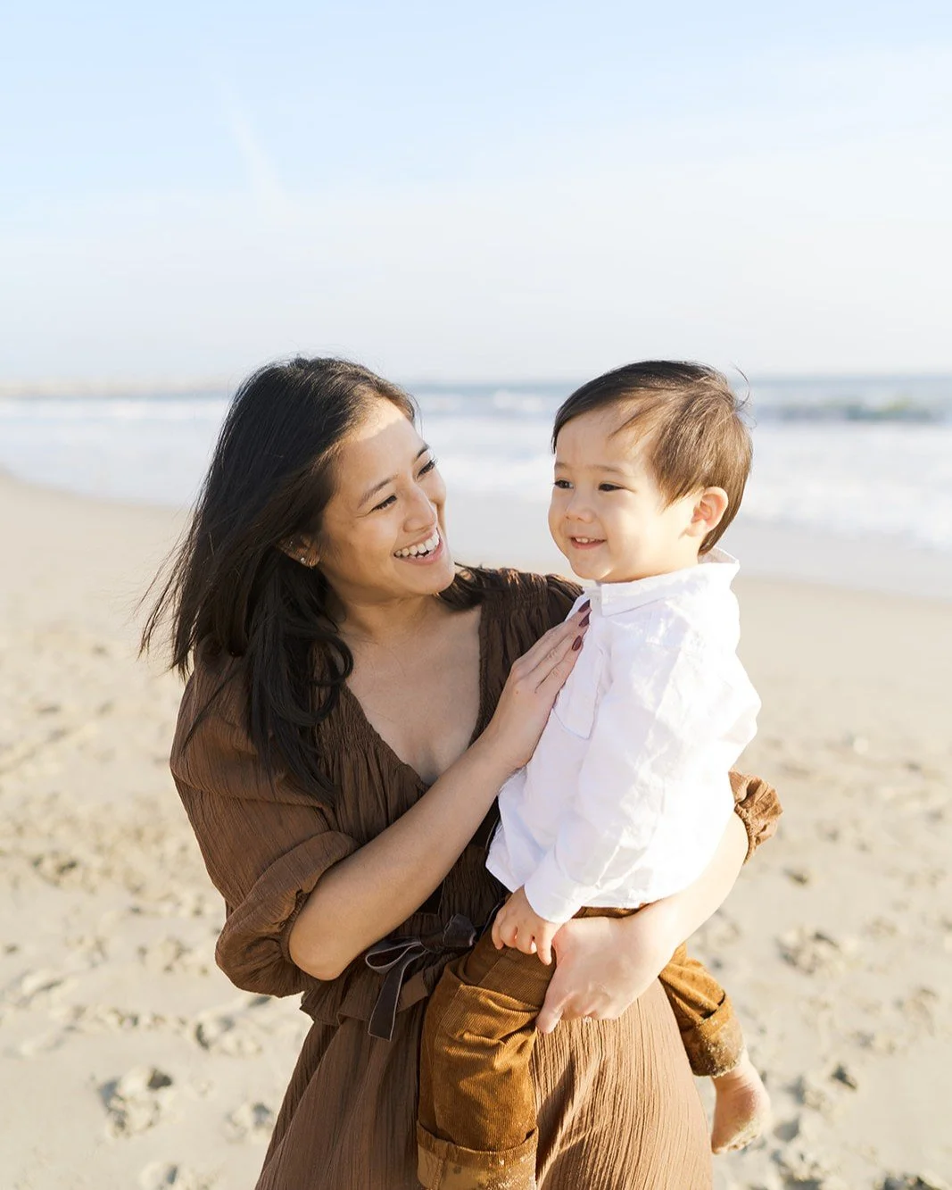 A little reminder for the moms who are always the ones taking the pictures:

You deserve to be in them, too.

Not just one nice photo for the Christmas card.

I want the way your child reaches for you. The little arms around your neck. The belly laug