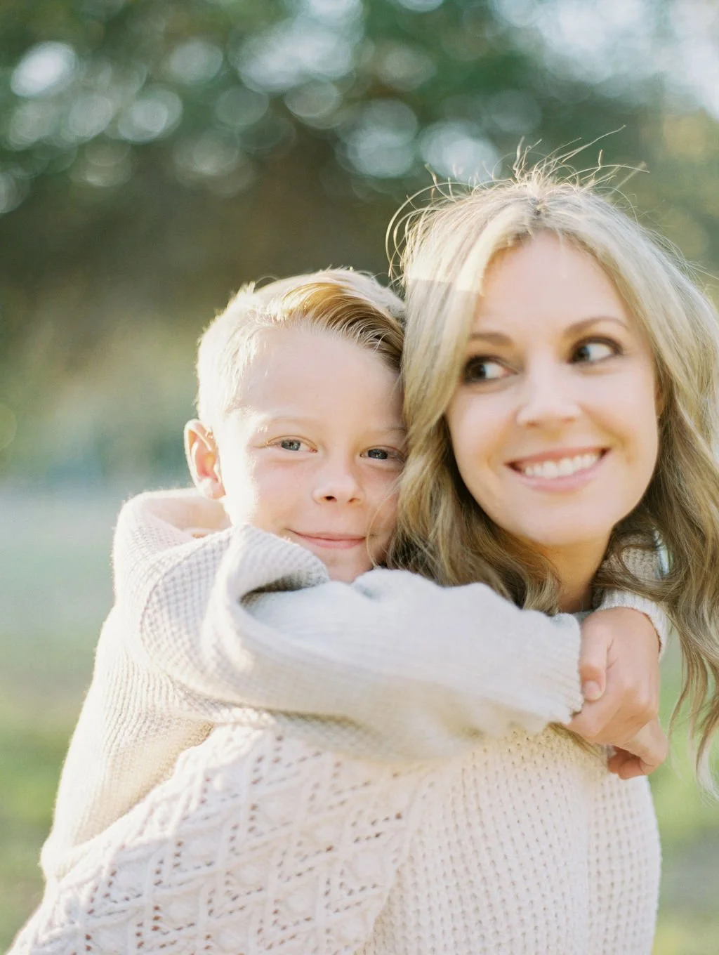 Mother holding her son during an outdoor family photography session in Orange County, California.