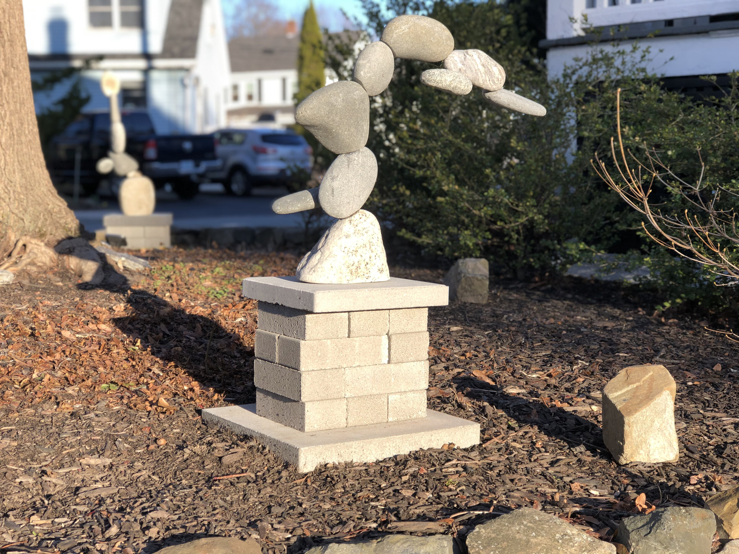Riptide and wave: stone and steel sculpture