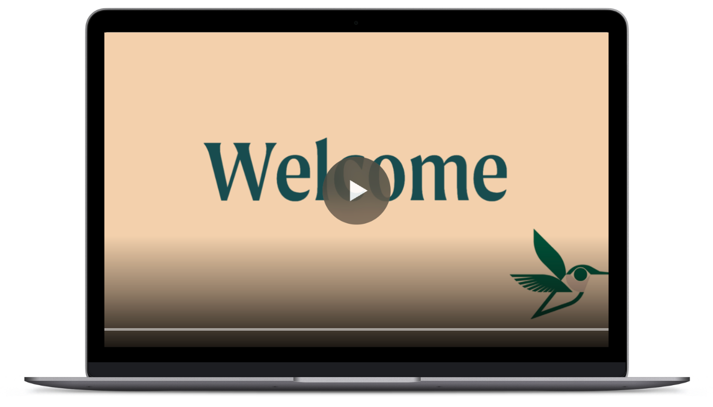 Laptop screen displaying a beige background with the word "Welcome" and a stylized hummingbird logo in the bottom right corner.