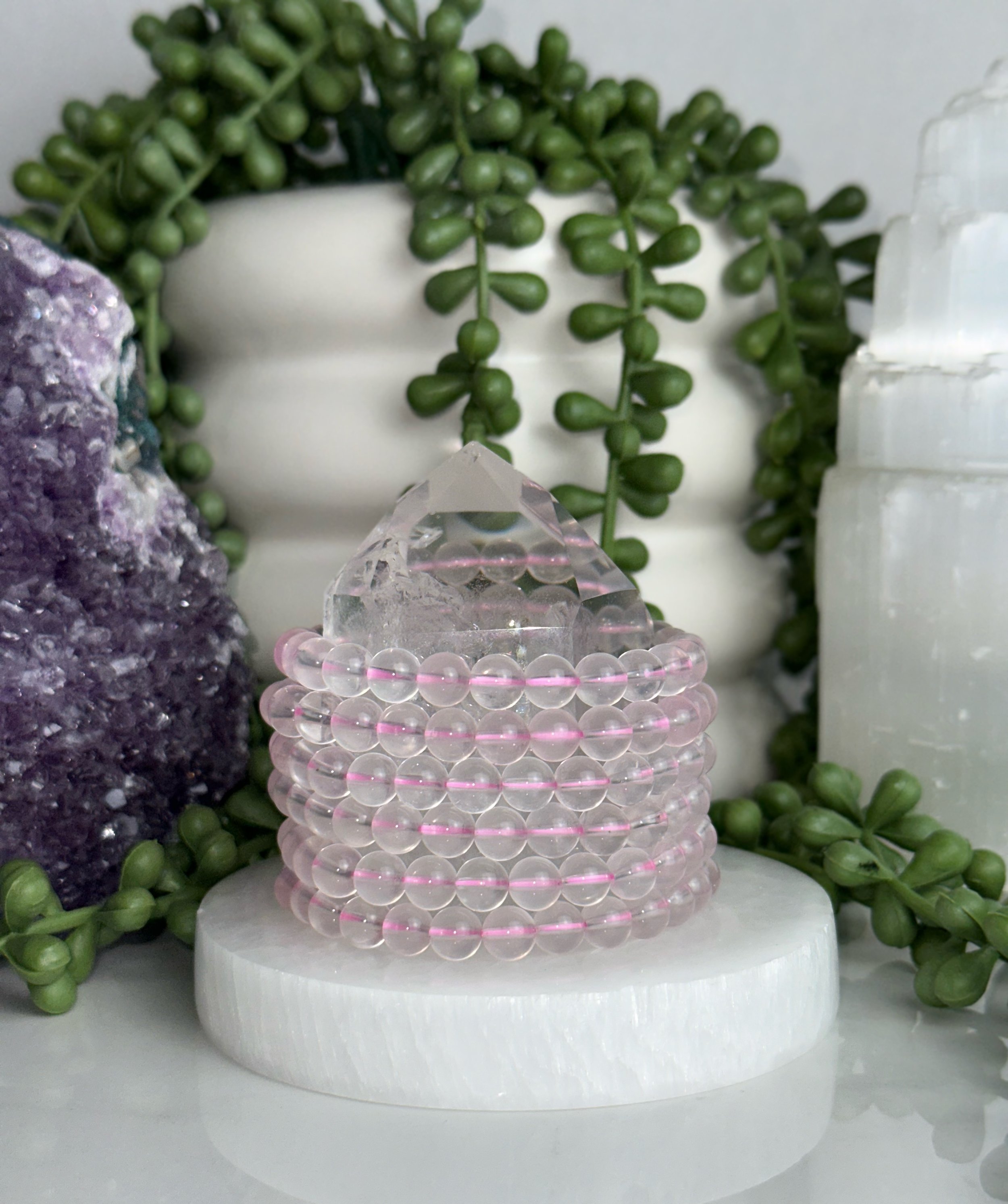 STAR ROSE QUARTZ 8MM ON SEL DISPLAY B.jpeg