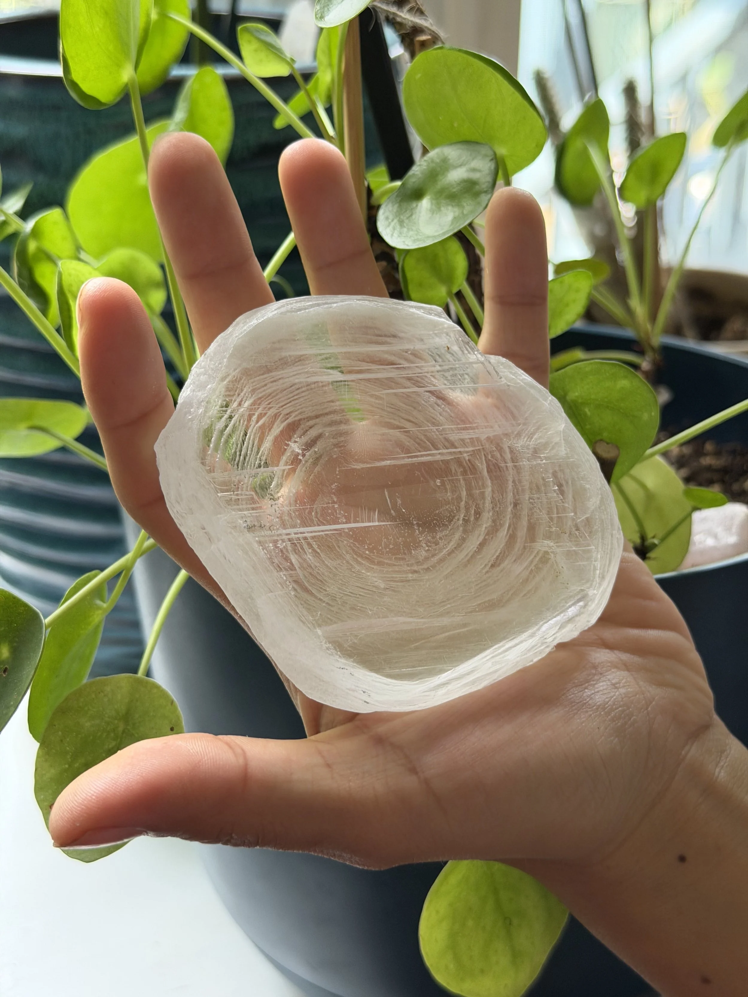 SELENITE FINGERPRINT IN HAND 30.jpeg
