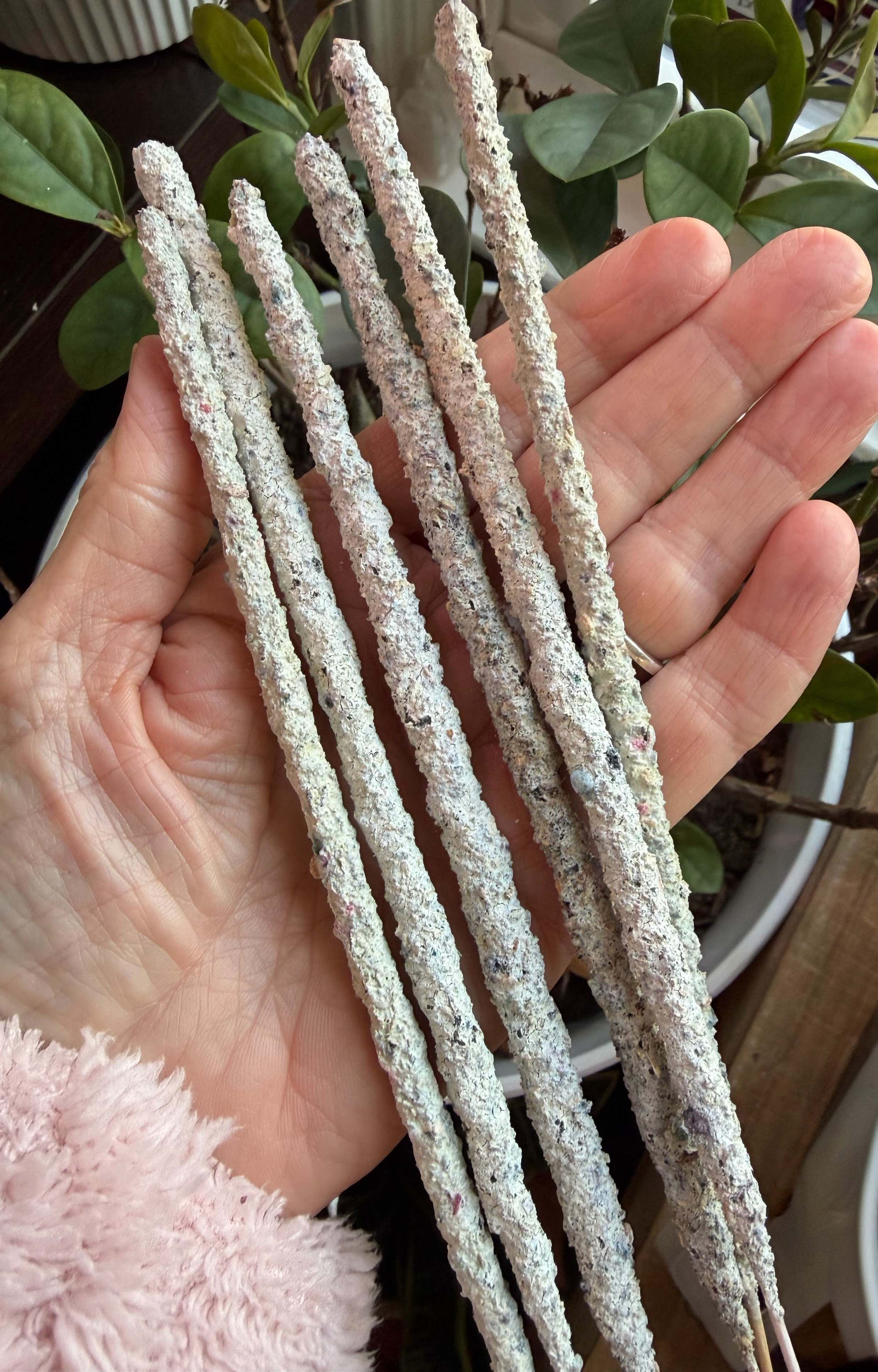 WHITE COPAL ARTISAN IN HAND.jpeg