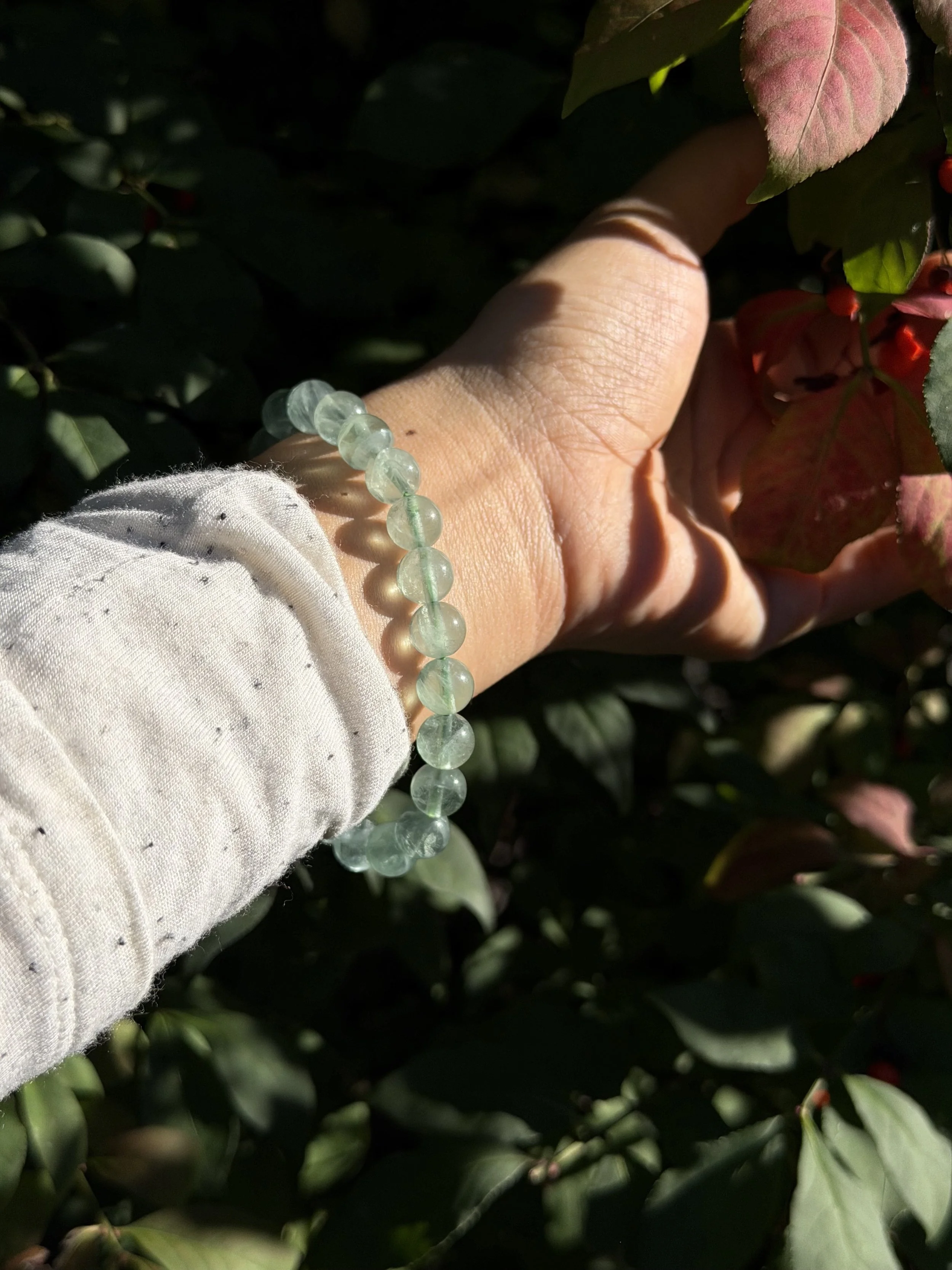 GREEN FLUORITE BRACELET ON HAND.jpeg