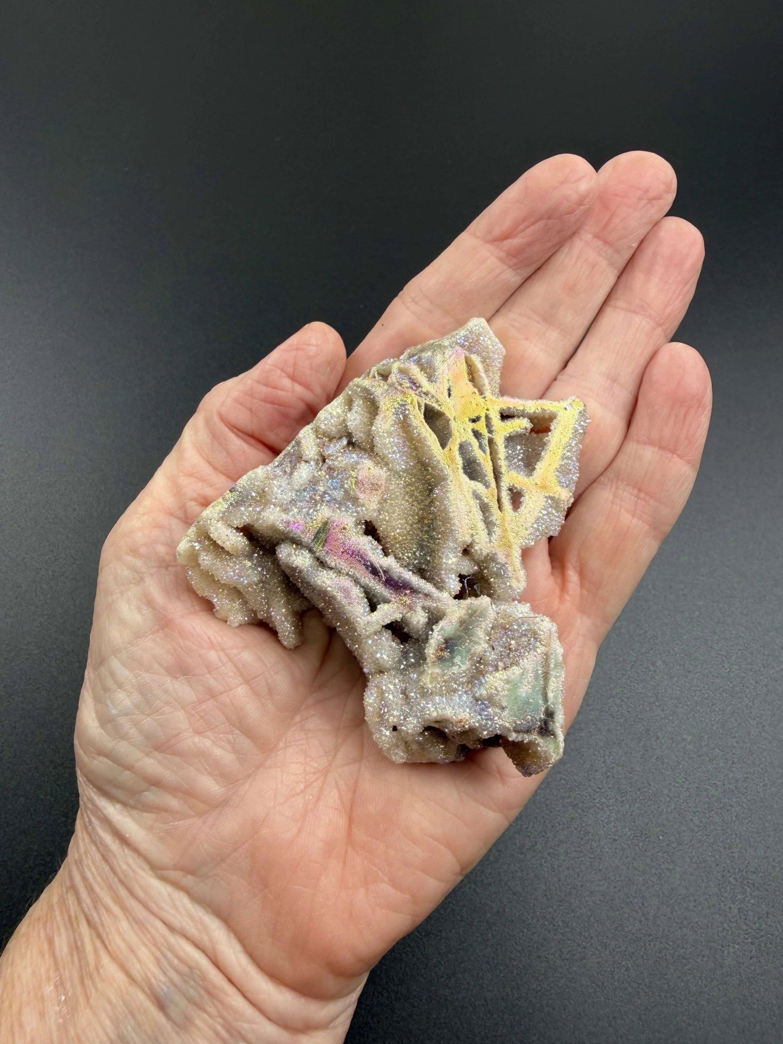 AURA SPHALERITE SLAB 6 IN HAND.jpeg