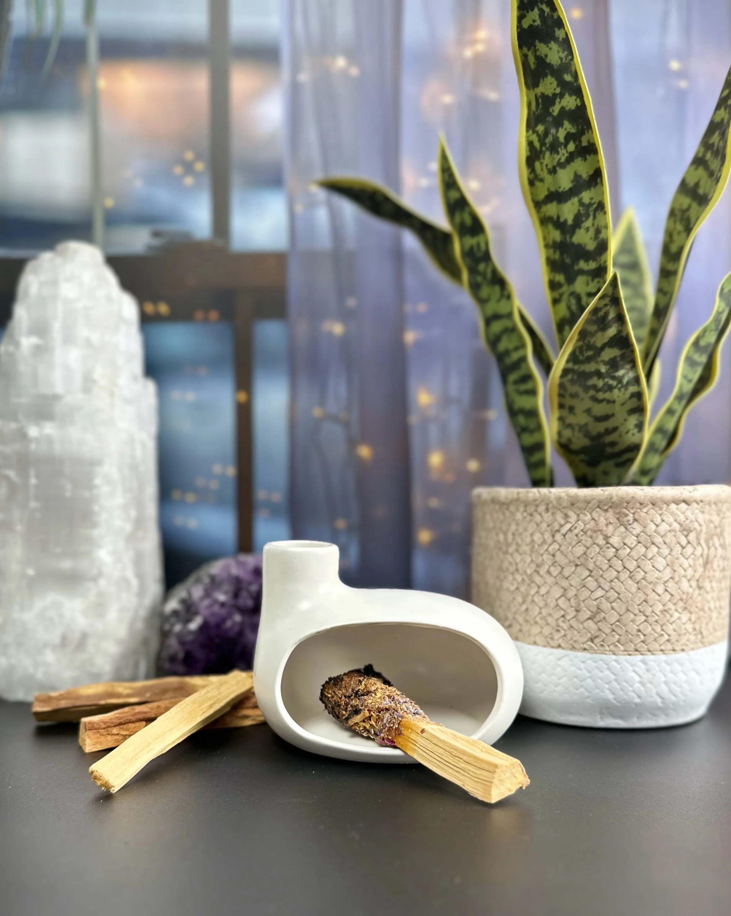 creamy white palo santo burner.jpeg