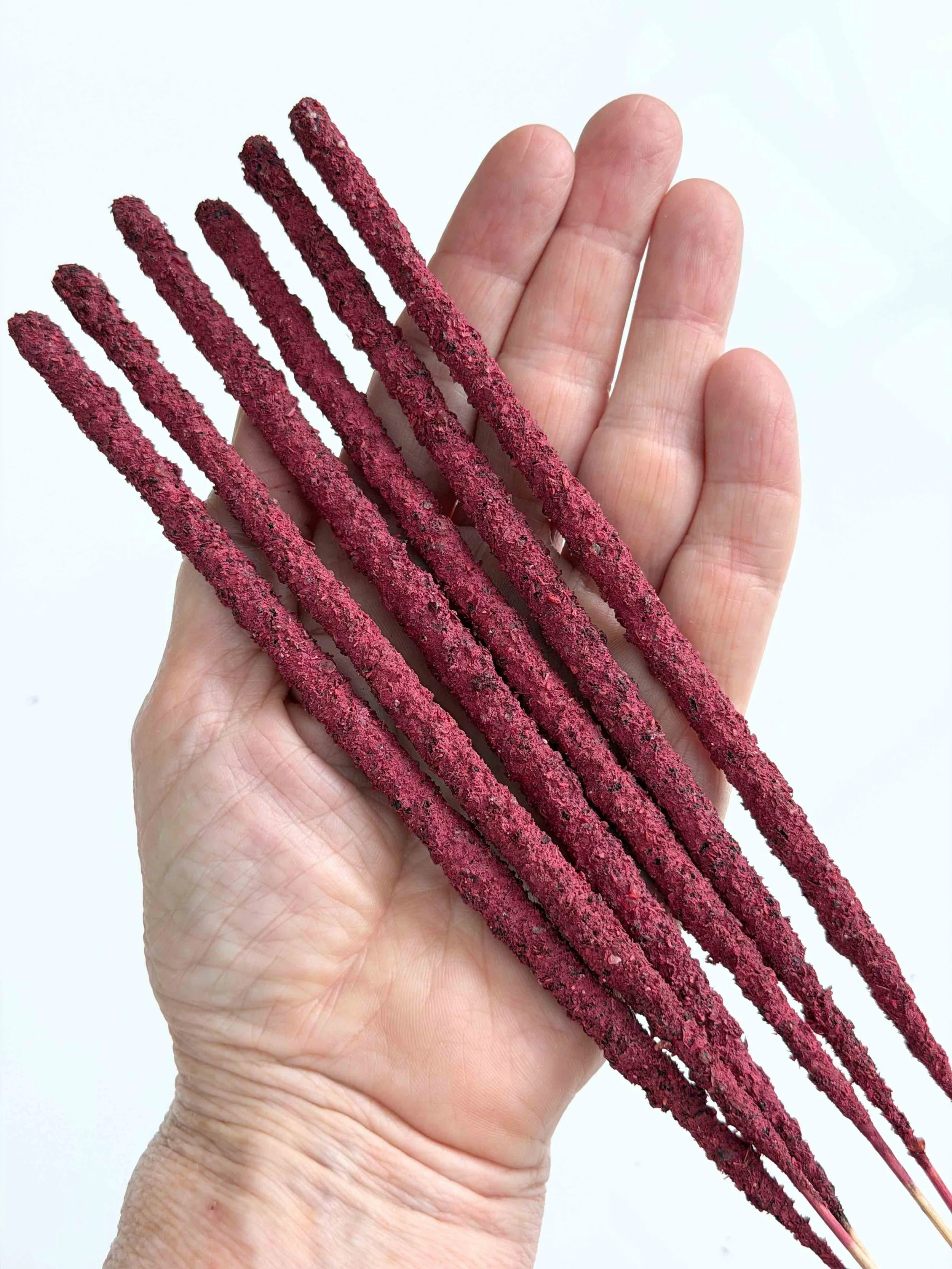ARTISAN DRGONS BLOOD INCENSE IN HAND B.jpeg