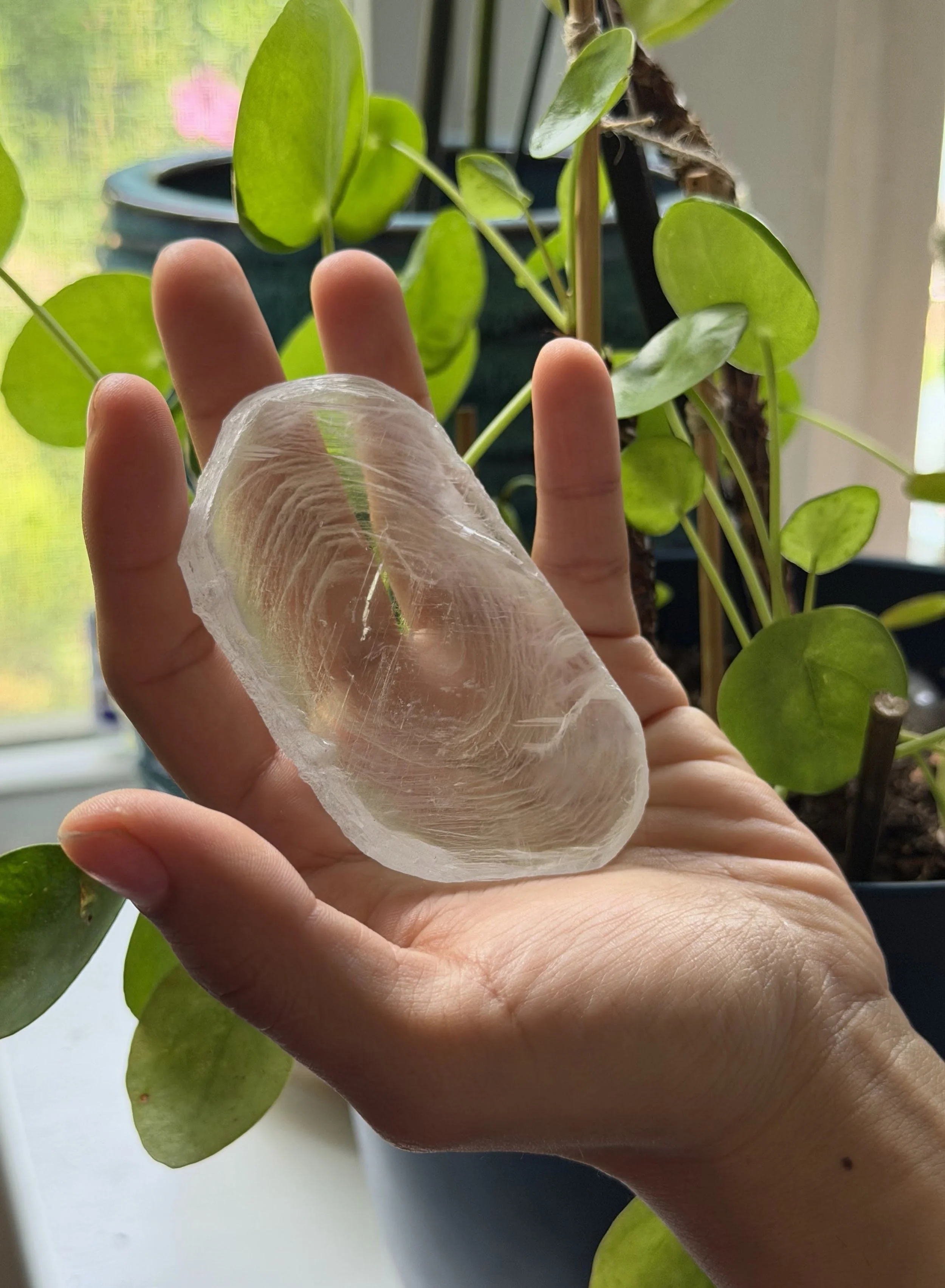 SELENITE FINGERPRINT IN HAND 3.jpeg