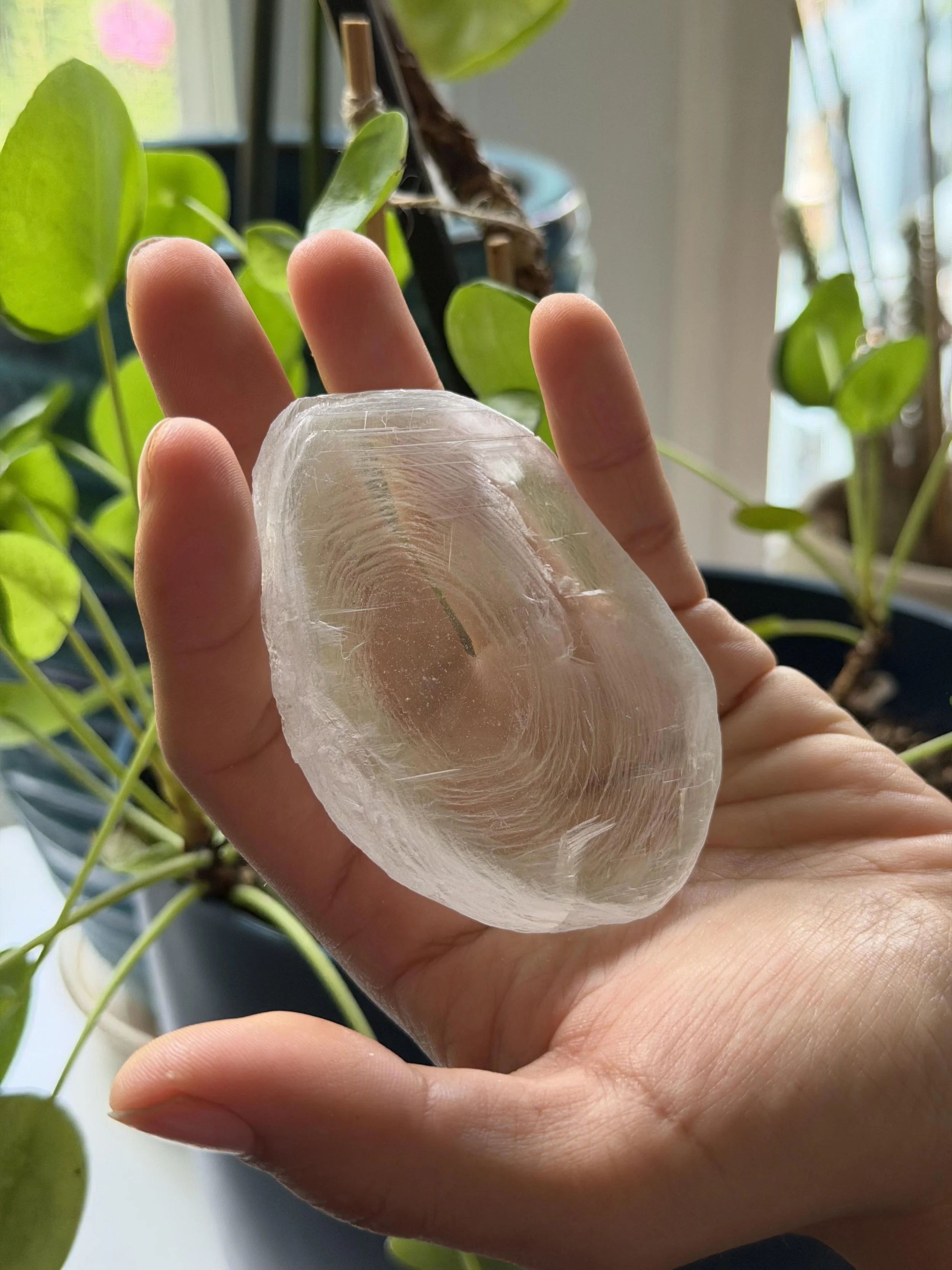 SELENITE FINGERPRINT IN HAND 11.jpeg