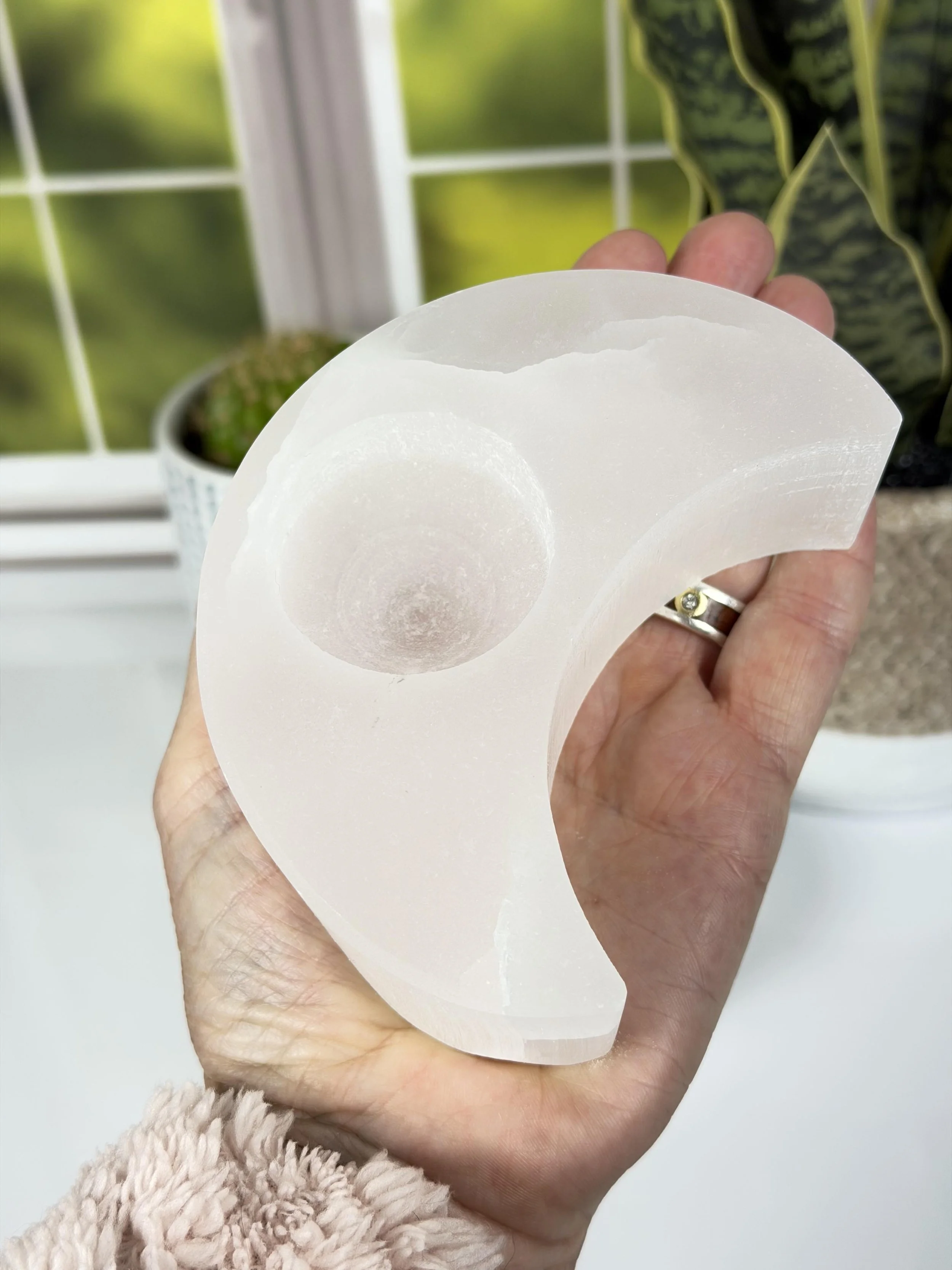 SELENITE TEALIGHT MOON B IN HAND.jpeg