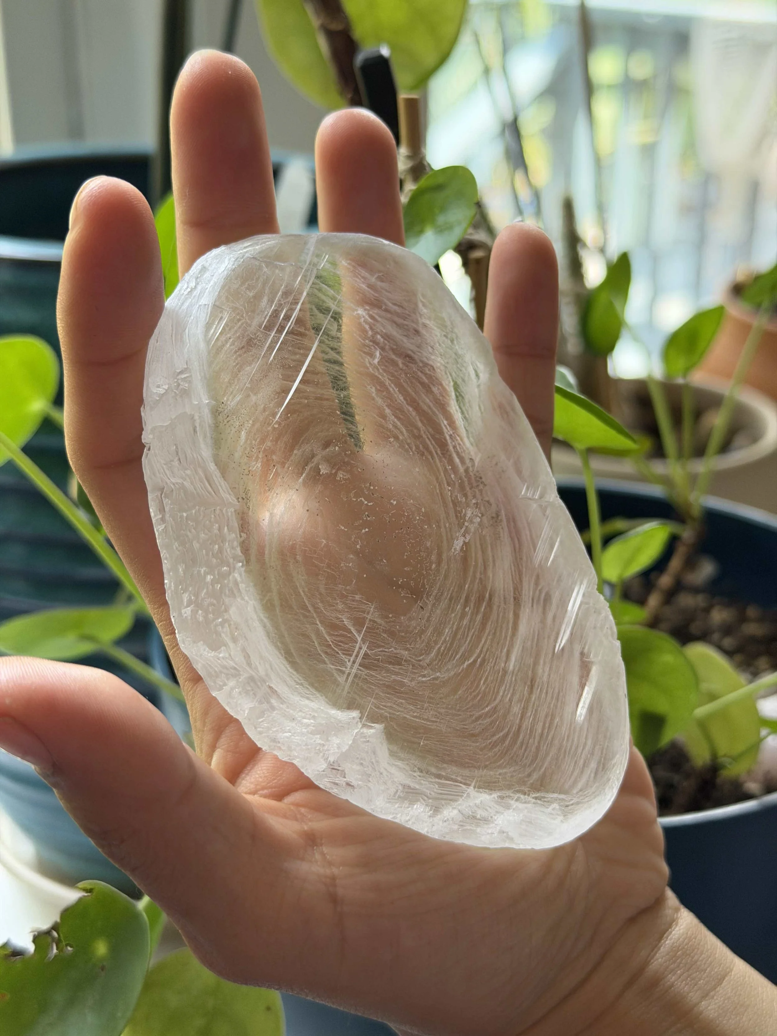 SELENITE FINGERPRINT IN HAND 26.jpeg