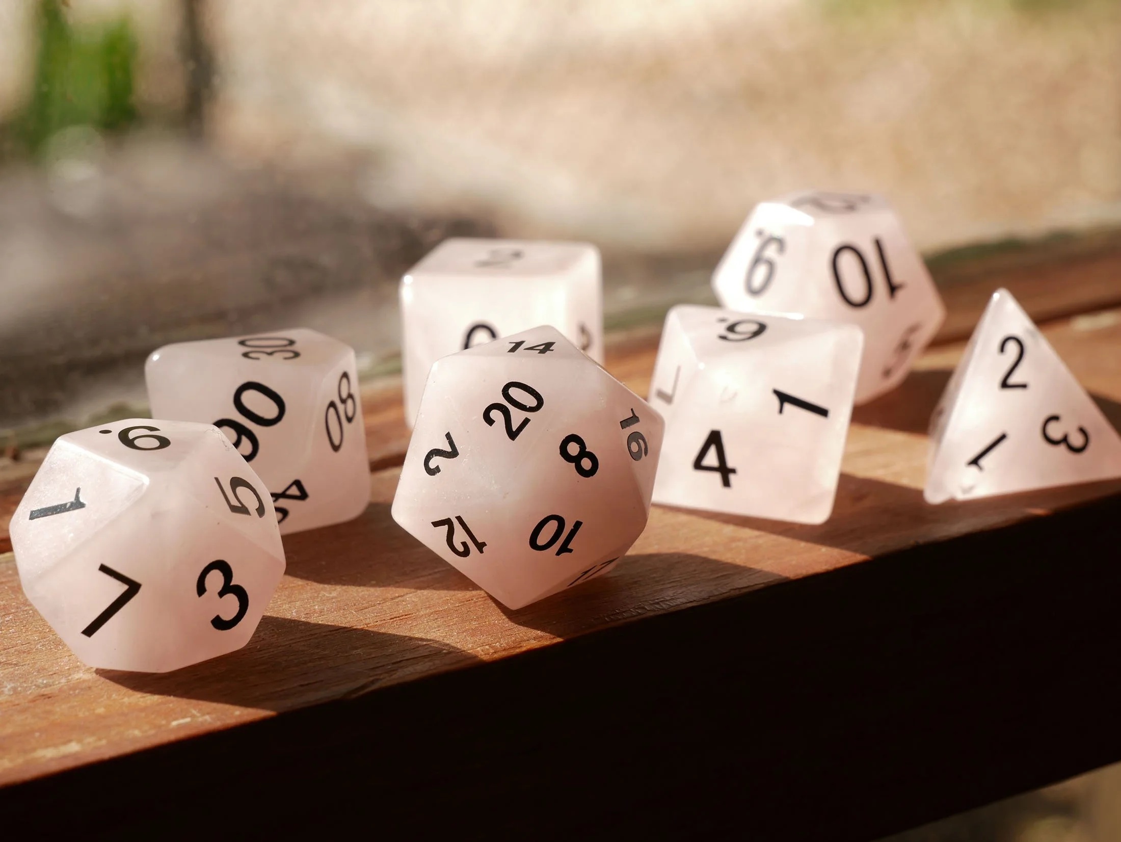 A group of 7 polyhedral dice for playing D&D