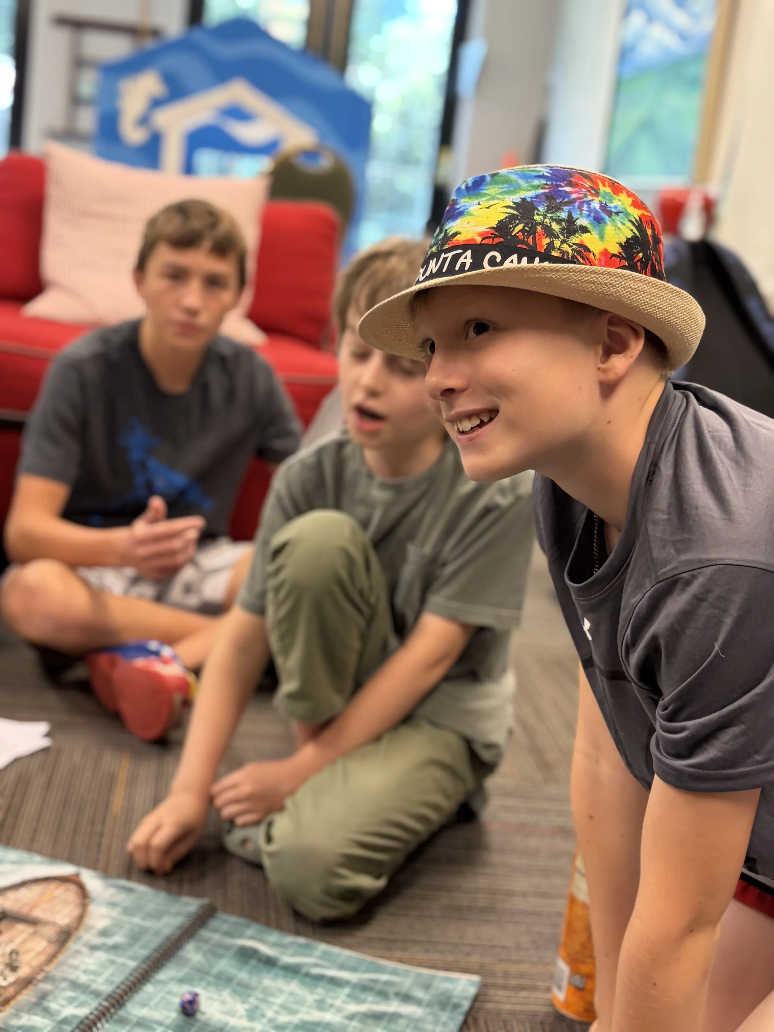 Three tween boys attend the Young Dragonslayers Dungeons and Dragons Camp in Davidson, North Carolina.