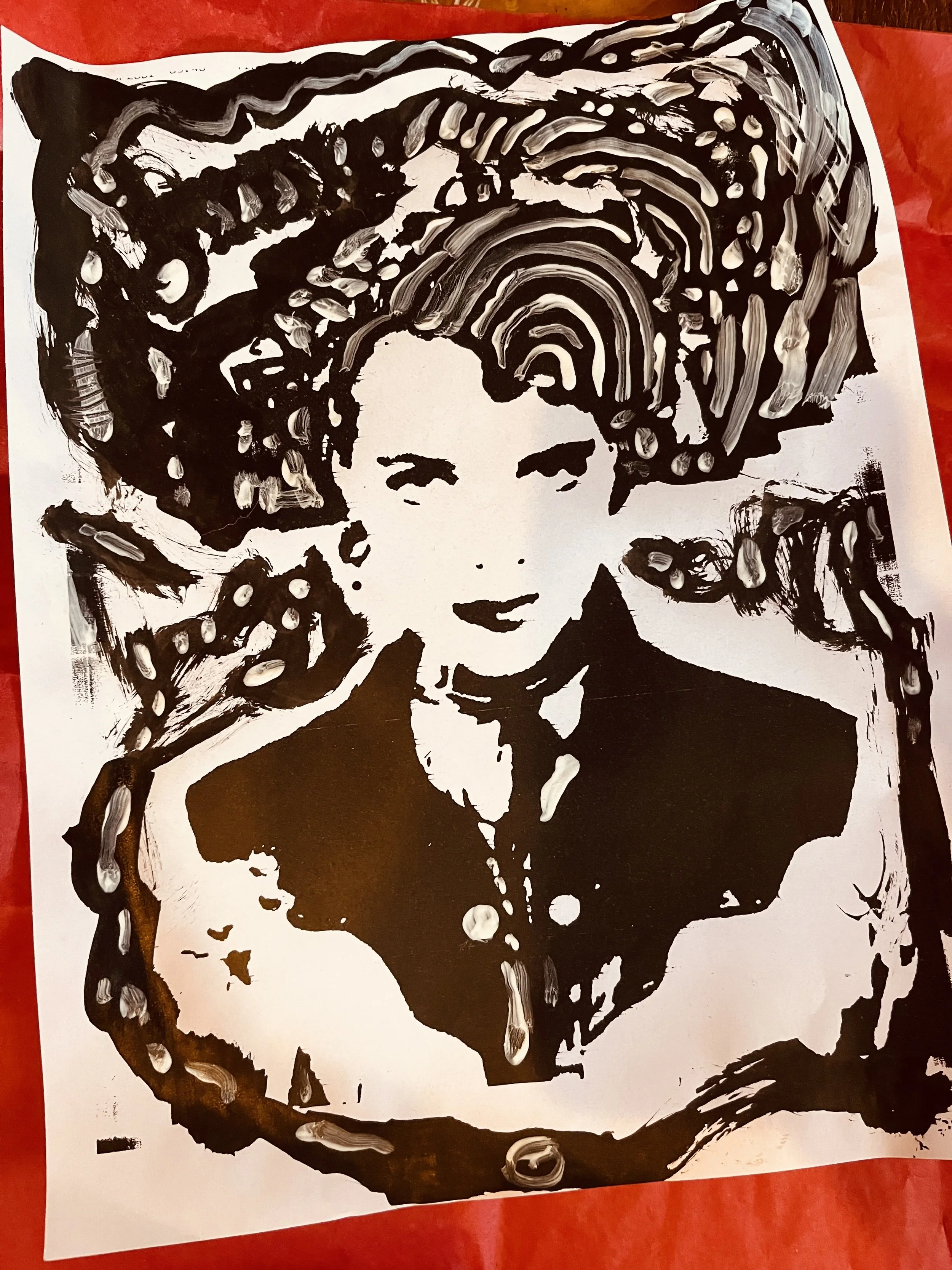 Bua drawing of Black and white stencil art Lizzie West portrait with chin-length hair, wearing a jacket, with abstract patterns and lines in the background.
