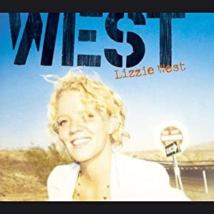 Book cover titled 'West' by Lizzie West featuring a smiling woman with curly blonde hair, standing outdoors in a rural area with a road sign in the background.