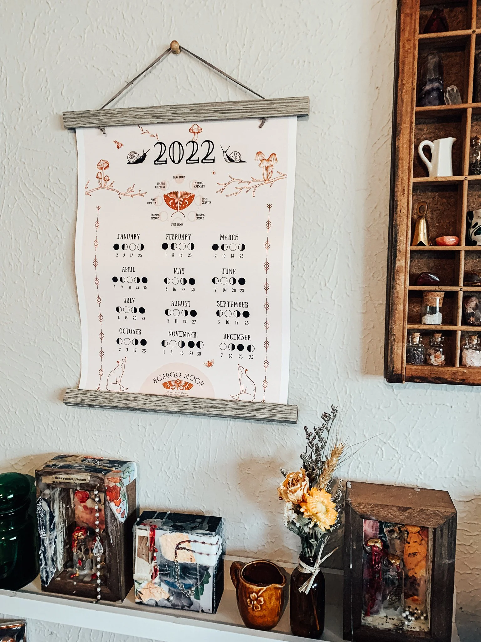 Calendar on my studio wall with other artwork.