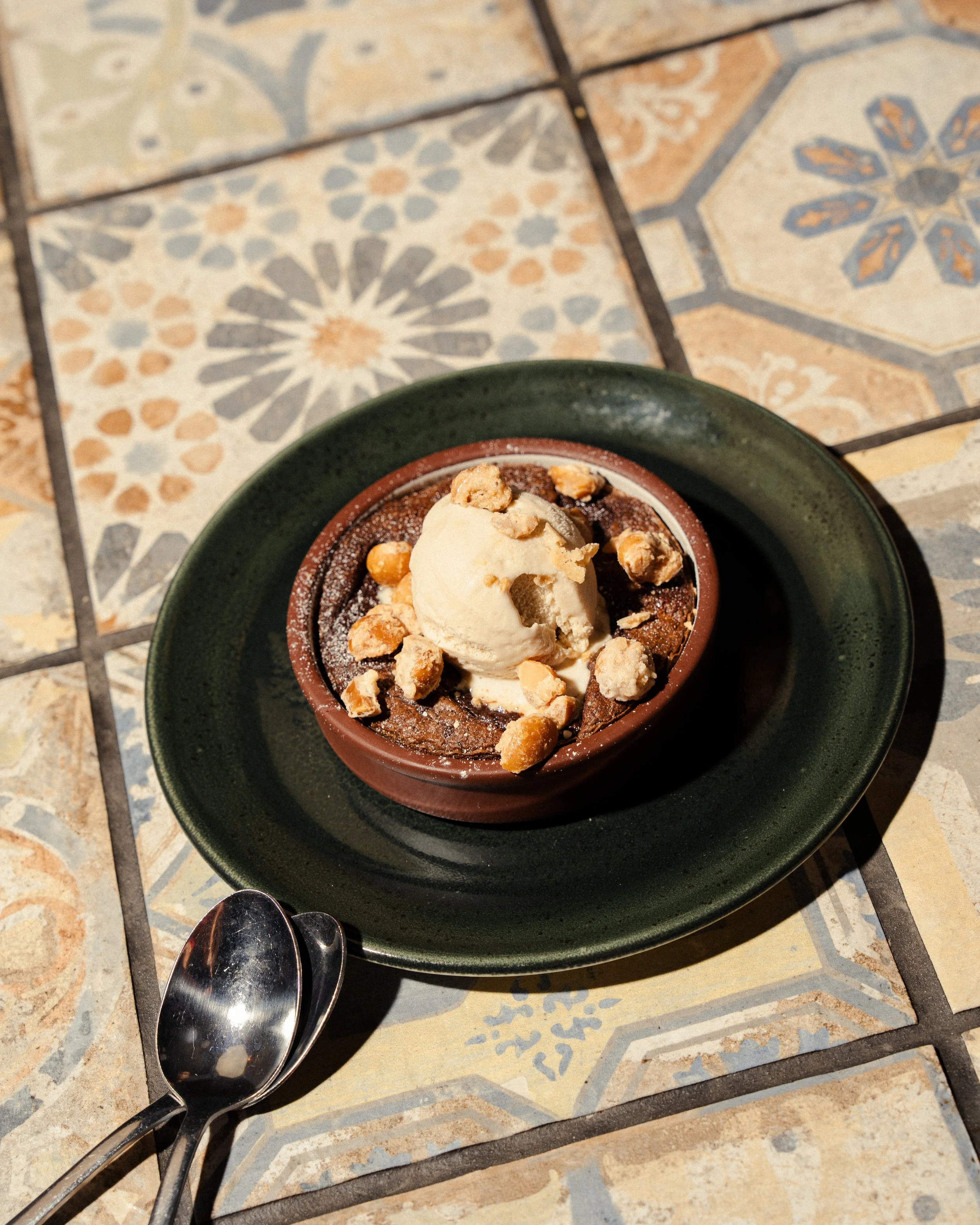 warm chocolate & wattleseed brownie, macadamia ice cream at teller