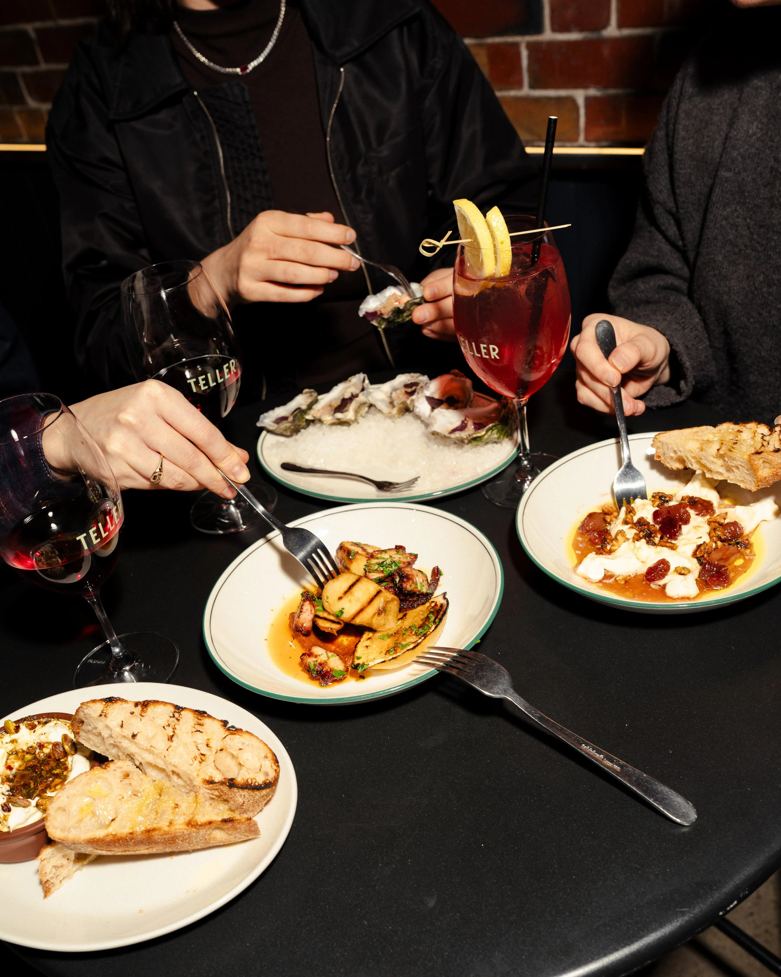 Guests enjoying dinner at Teller laneway