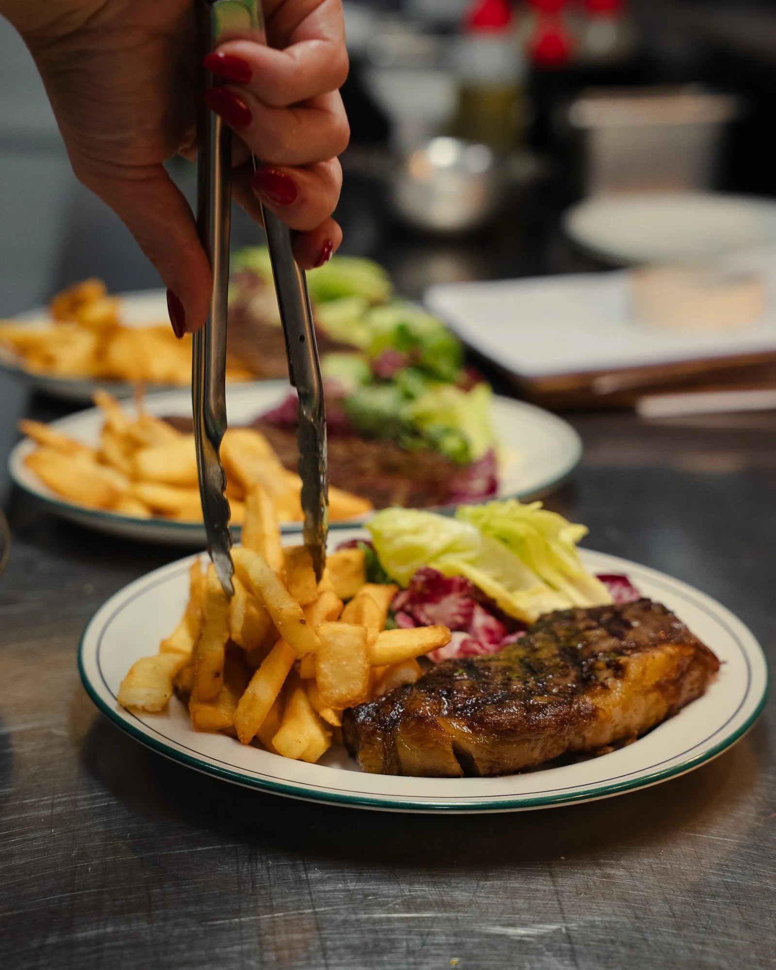 Kitchen preparing for steak night at Teller