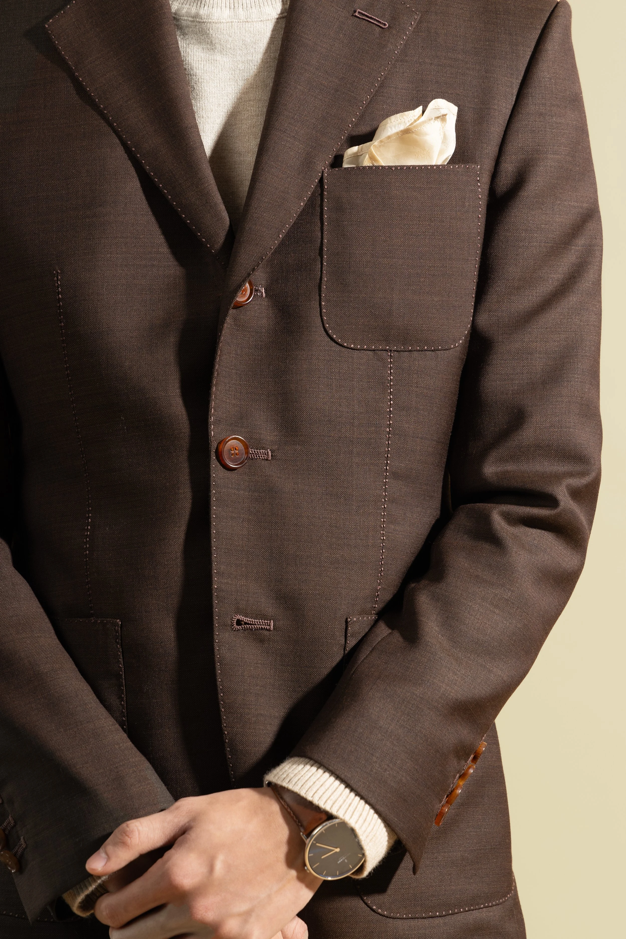 Close up of a Sein Shwe Bespoke cacao brown 3-roll-2 blazer