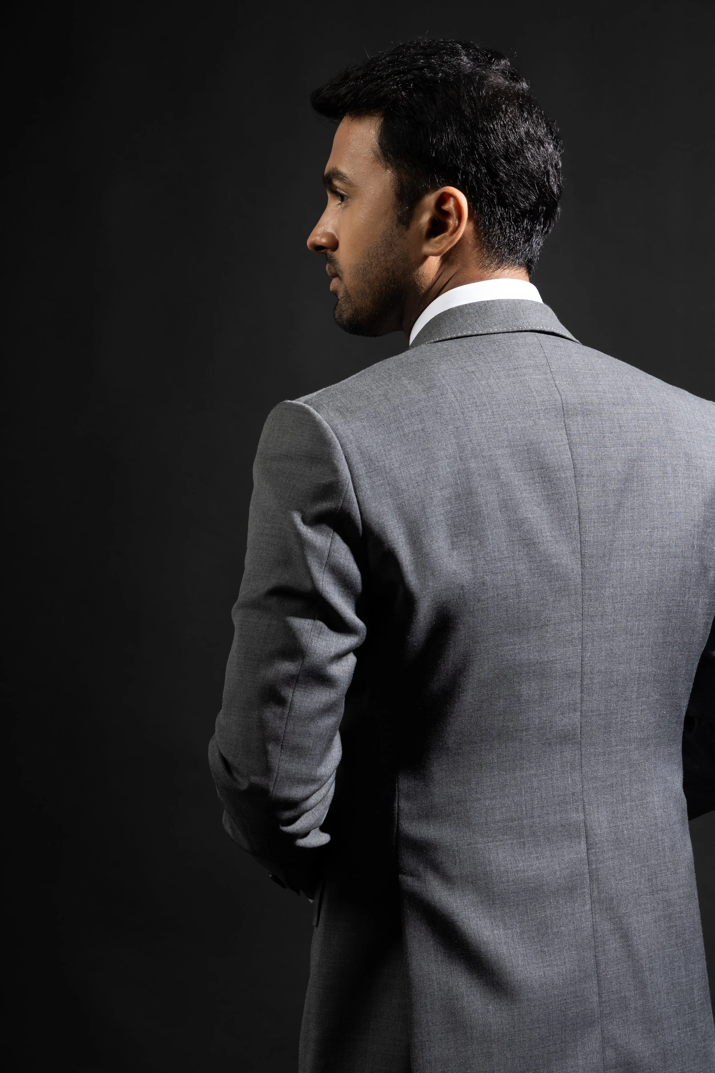 Back shot of a grey bespoke suit jacket