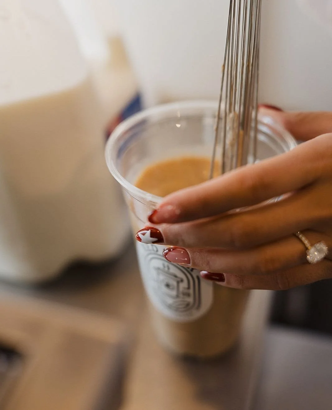 Serving iced coffee with a side of smiles 😄☕