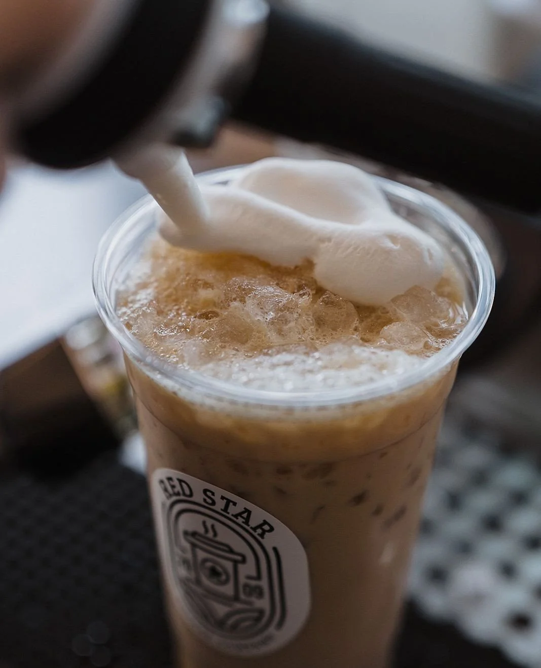 What&rsquo;s your Monday morning go-to? 👀☁️ Because this one is calling your name ✨️Vanilla + Hazelnut Iced Latte ✨️