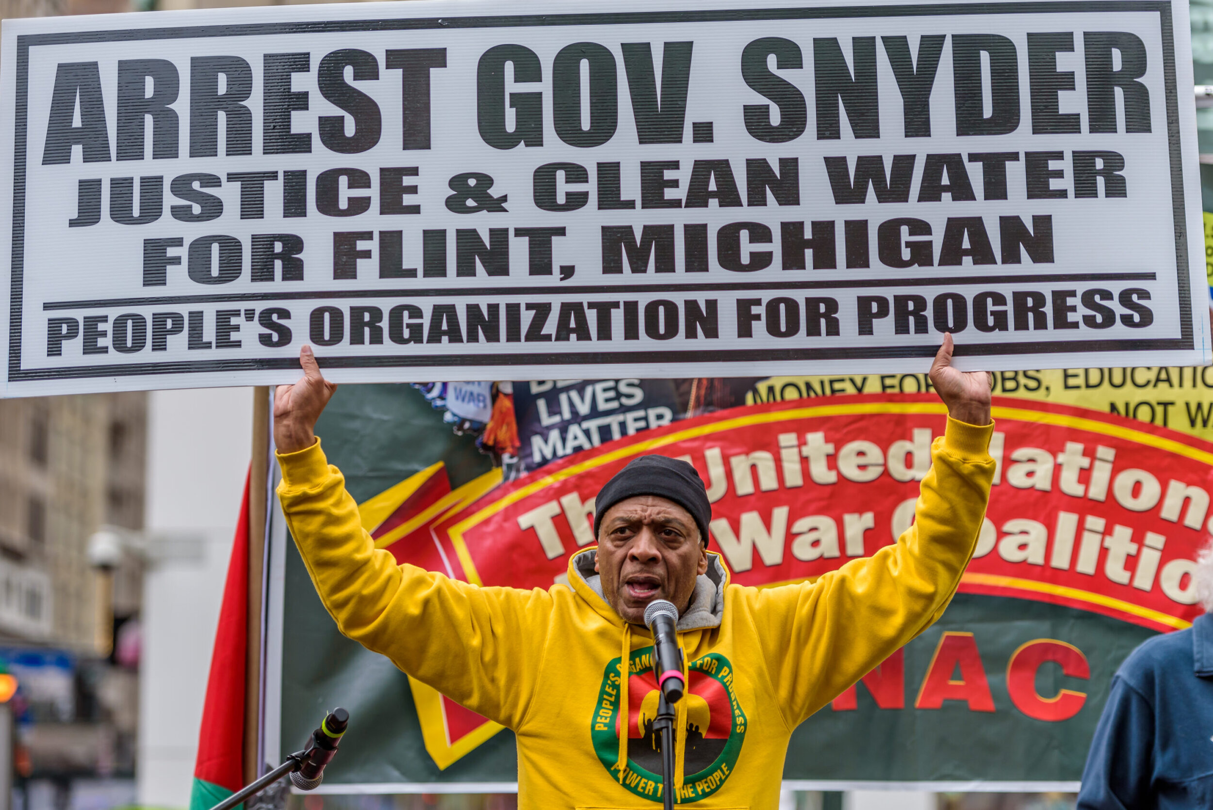Lawrence Hamm from People’s Organization for Progress speaking at the Day of Peace and Solidarity in New York City. Organized by United National Antiwar Coalition, anti-war, anti-racist and social justice activists gathered at Herald Square in New York City, protesting against continued war and to demand money for human needs. © 2016 Erik McGregor