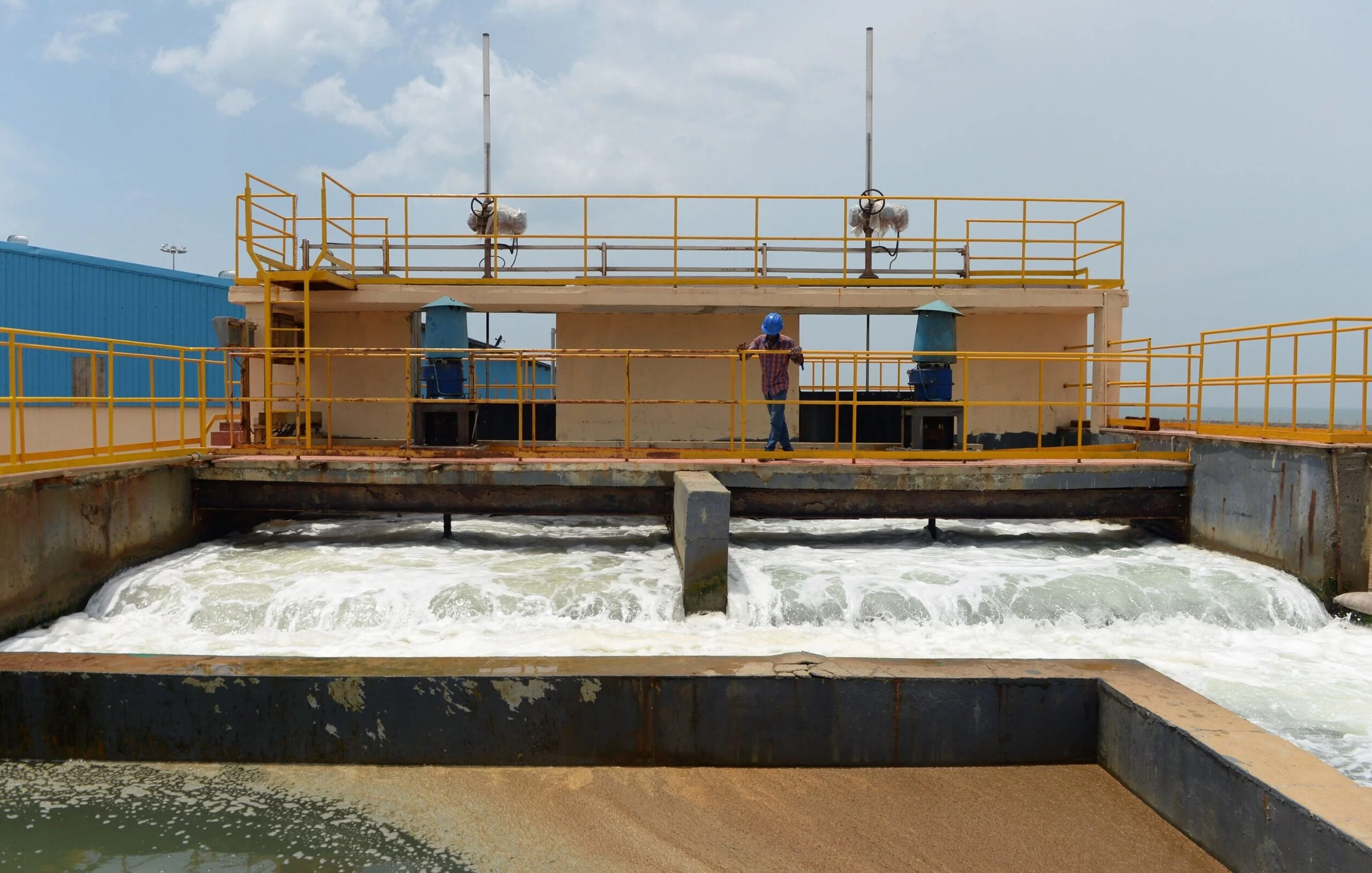 An Indian worker inspects a pumping station at a sea water desalination plant on the outskirts of Chennai in June 2019. Tamil Nadu Chief Minister Edappadi Palaniswami has laid a foundation stone for a second unit of a desalination plant near Chennai, with a capacity to treat 150 million litres of sea water a day to make drinking water for the city that has been experiencing a severe shortage of fresh water as its reservoirs ran dry. (Photo by ARUN SANKAR/AFP via Getty Images)