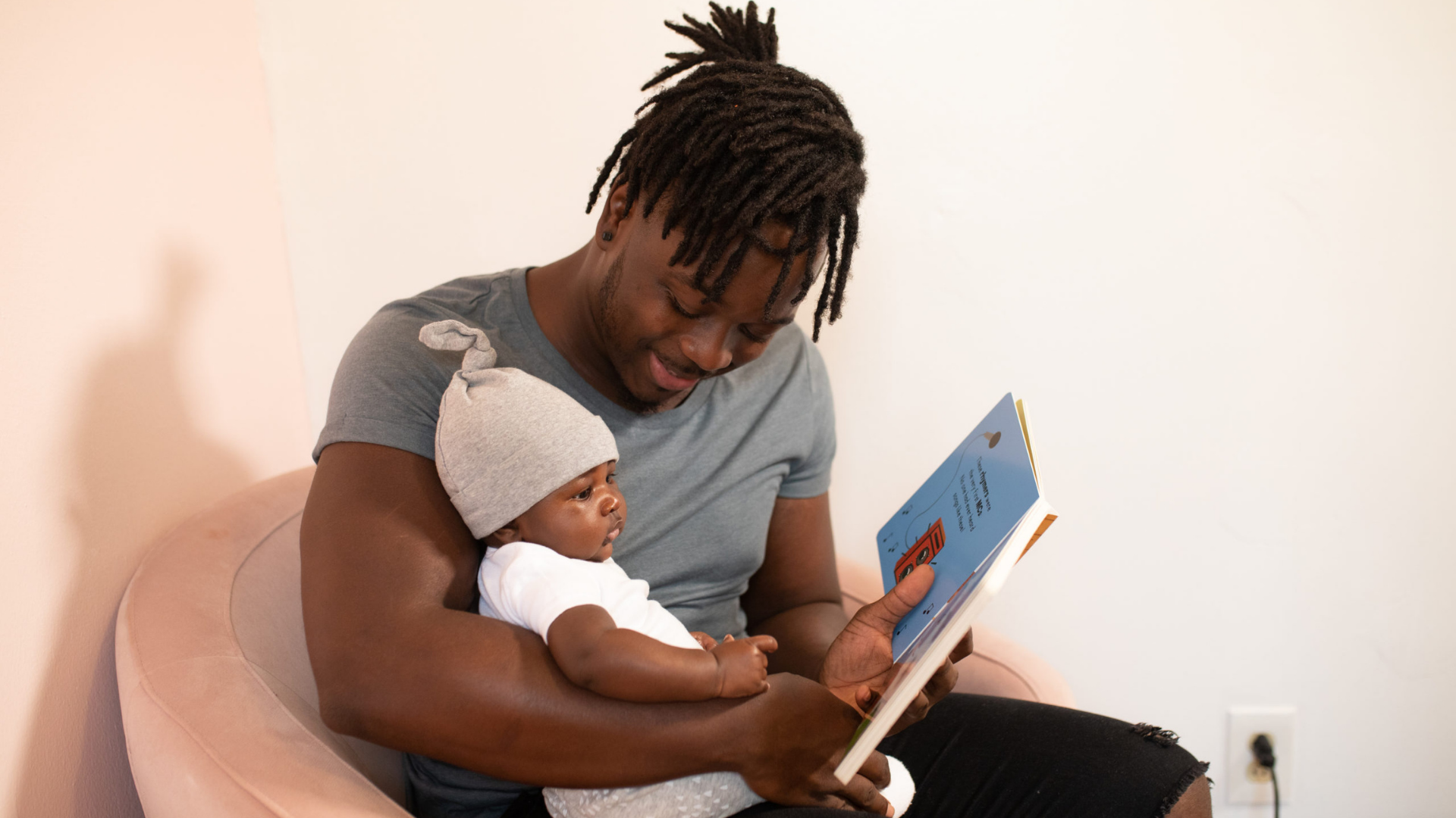 Parent reading to baby