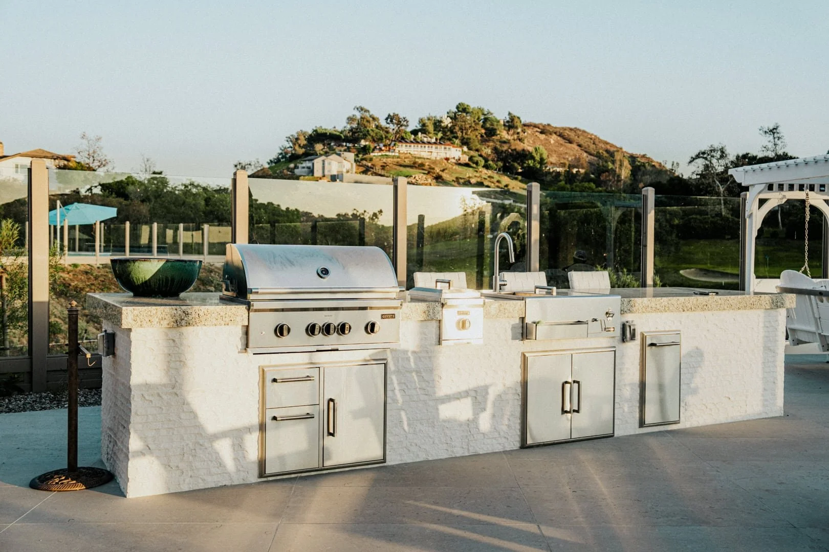 Custom outdoor grilling area with grill and sink.jpg