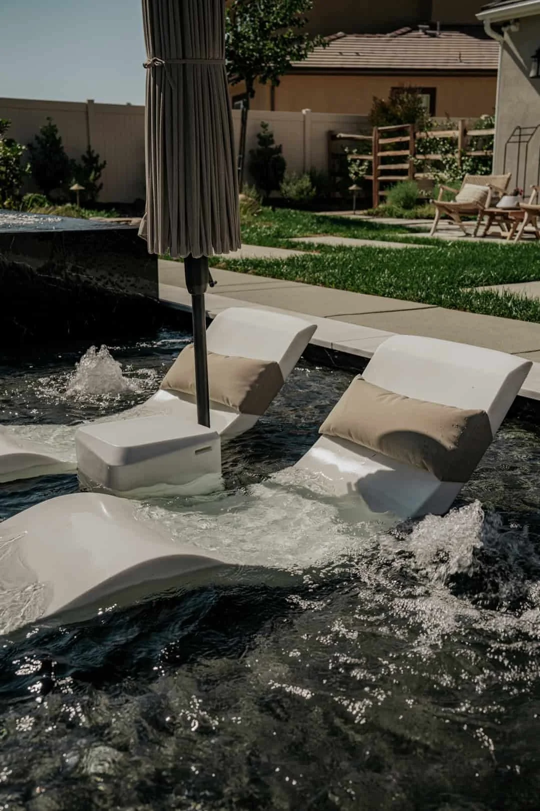 Baja Shelf with tanning chairs in a pool.jpg