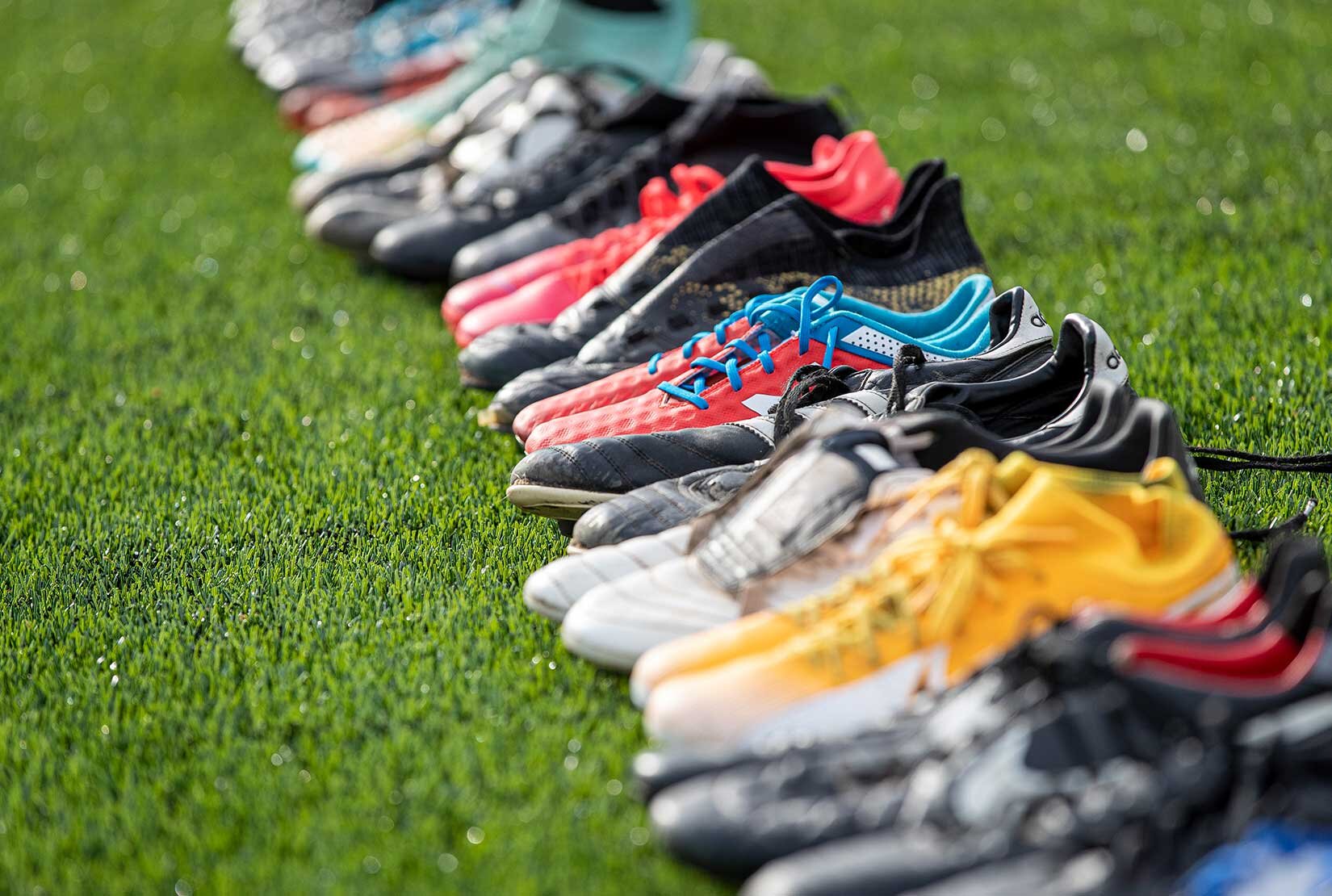 football boots on grass