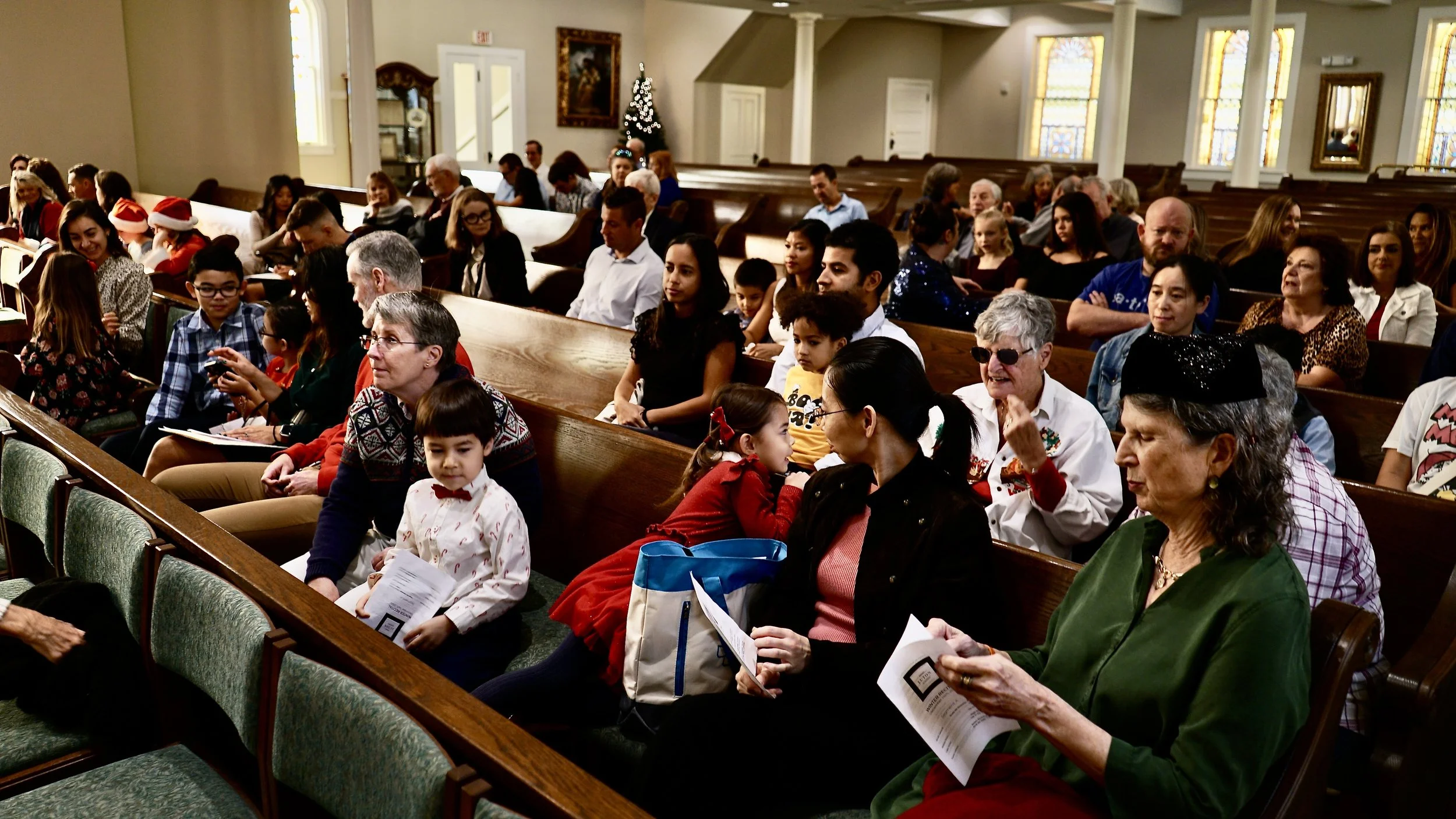 Students and families of Luton Piano Academy eagerly anticipate the performances they will hear at the Winter Piano Recital 2024.