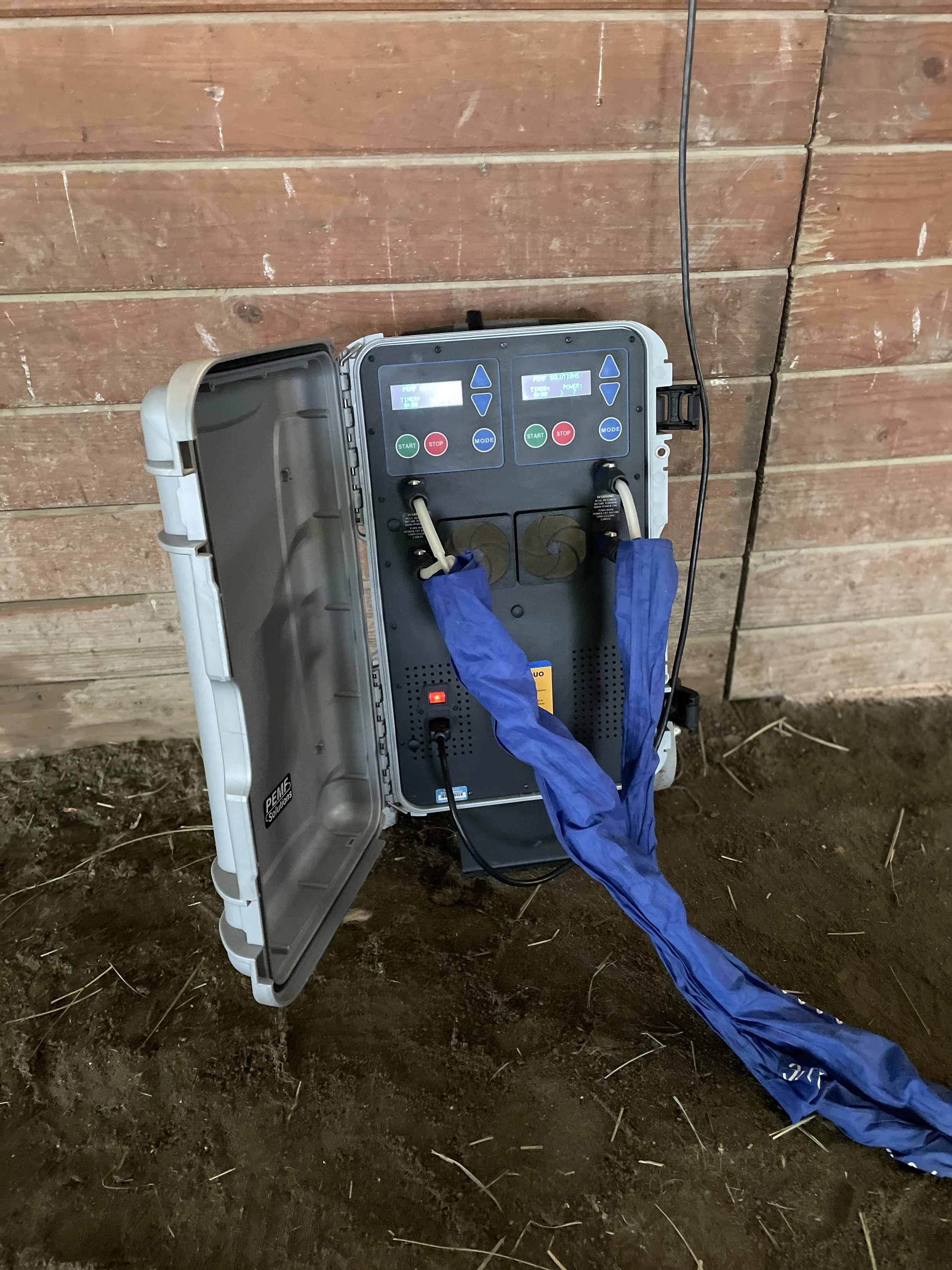 MagnaWave PEMF machine set up in a horse arena