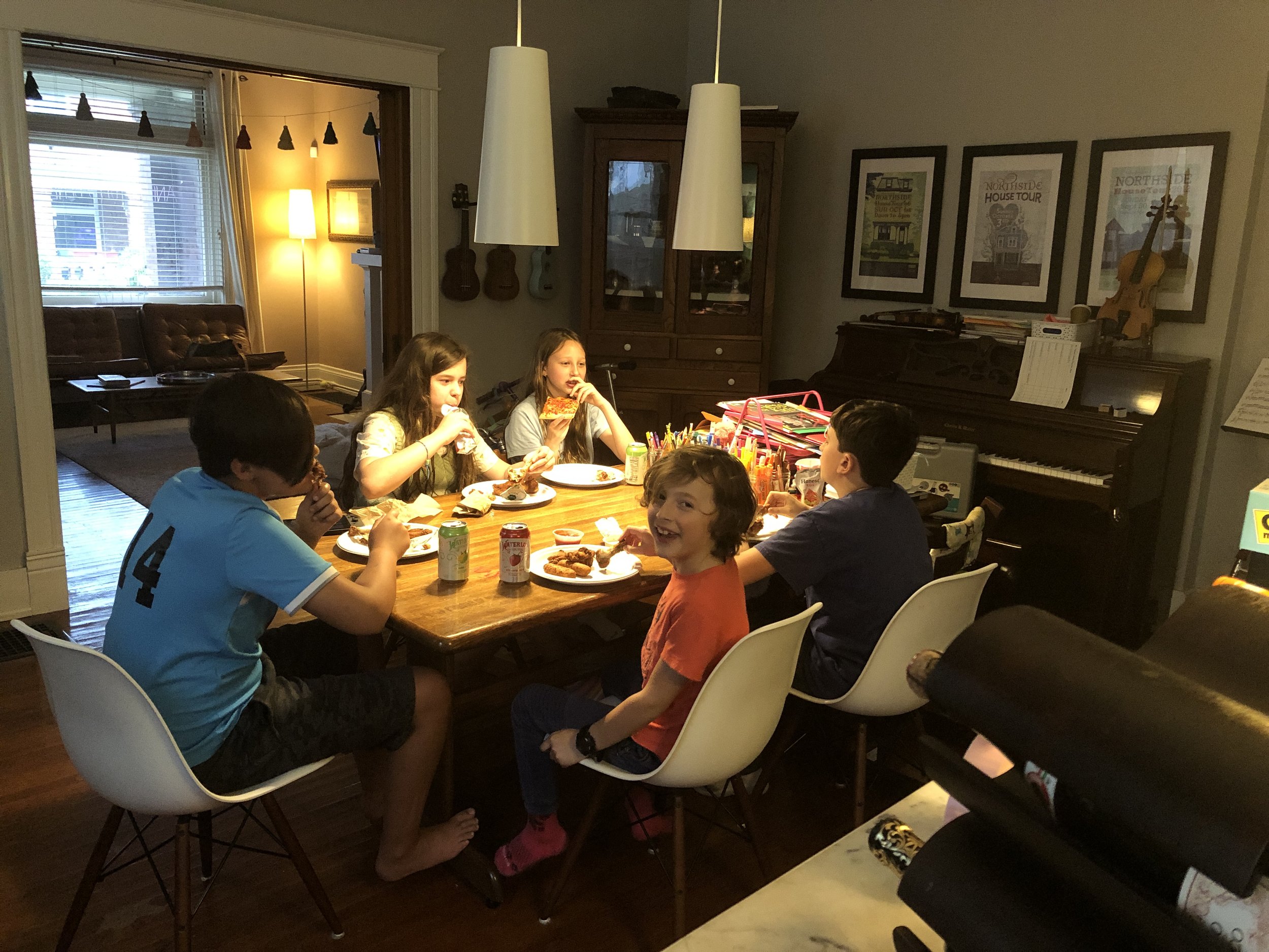 During the summer, the kids on our block had some sort of club going where they ate pizza, played chess, and watched TV.