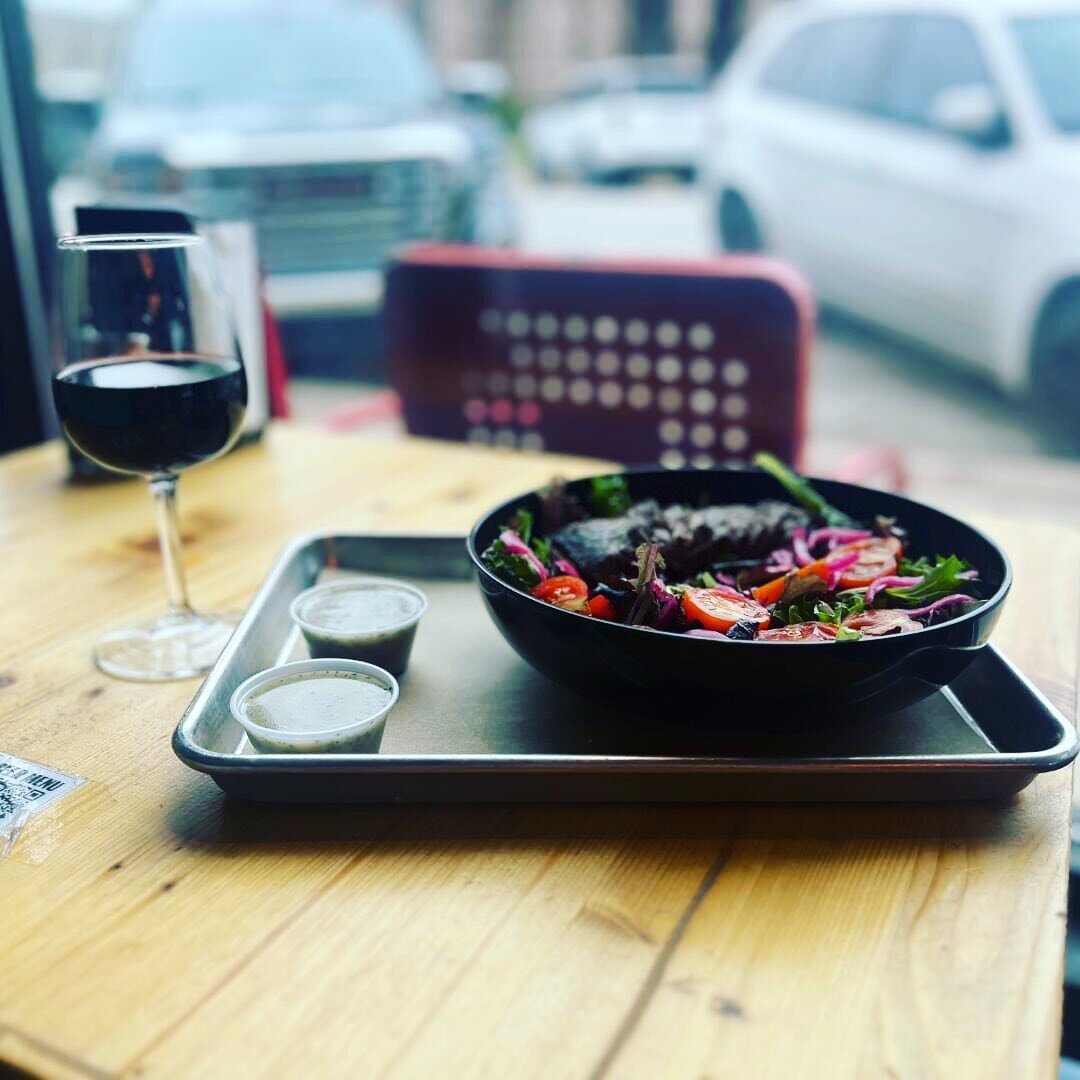 🥗 🍷 Indulge yourself with our House Salad with steak and a glass of red wine. 
.
.
We start with mixed greens, then add red onion, cherry tomatoes, roasted pepitas, and your choice of ranch or poppy seed vinaigrette. You can also add grilled or fri