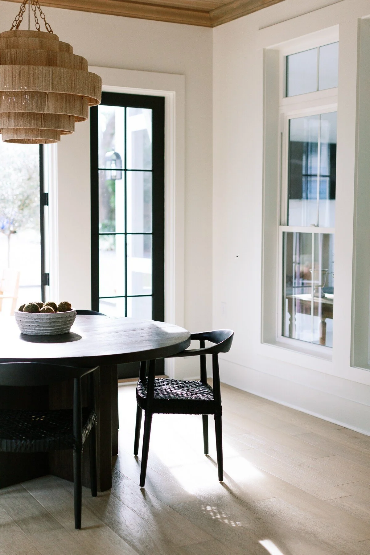 Living room with a blue-shiplap wall, a mounted flat-screen TV, a wooden fireplace mantel, and a modern fireplace.
