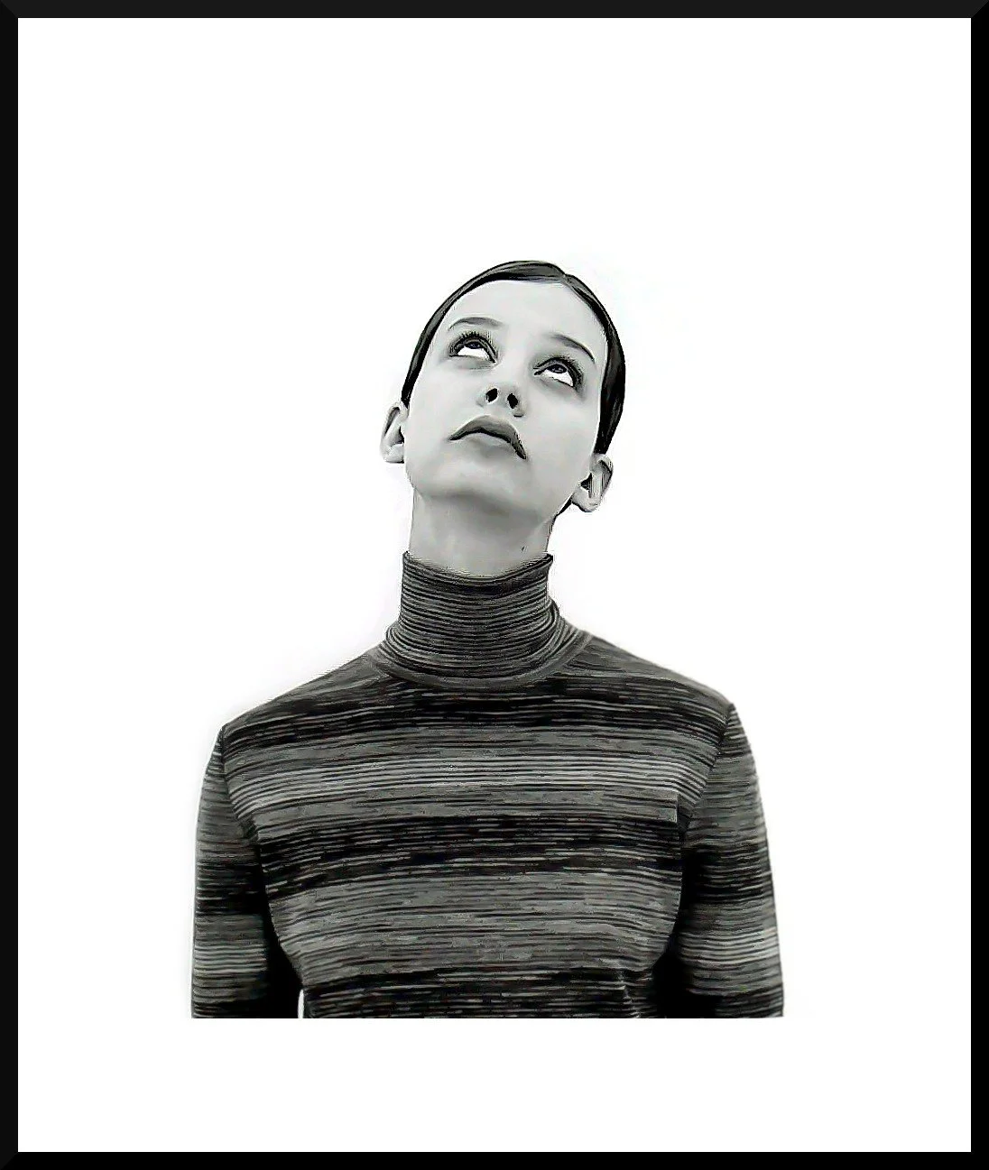A young woman with a short haircut wearing a striped turtleneck looks upward with a neutral expression against a plain background.