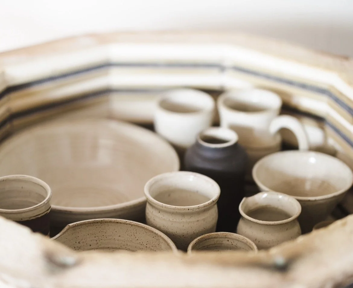 Freshly kiln-fired handmade stoneware bowls, mugs and serving pieces by Hayes Ceramics.