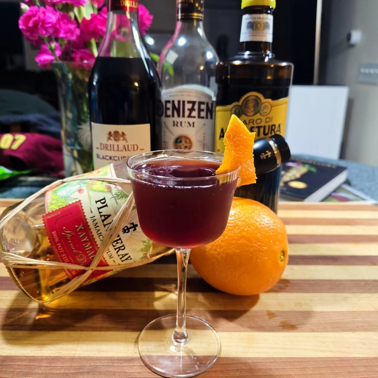 New Cocktail...its stirred, so its strong.

Red Sky at Night [Sailor's Delight]

1.5 oz Aged Spanish Style.Rum
0.5 oz  Jamaican Rum [Xaymaca]
0.5 oz Amaro di Angostura
0.25 oz Cr&egrave;me de Cassis
0.125 oz Demerara Syrup (2:1)
1 dash Angostura bitt