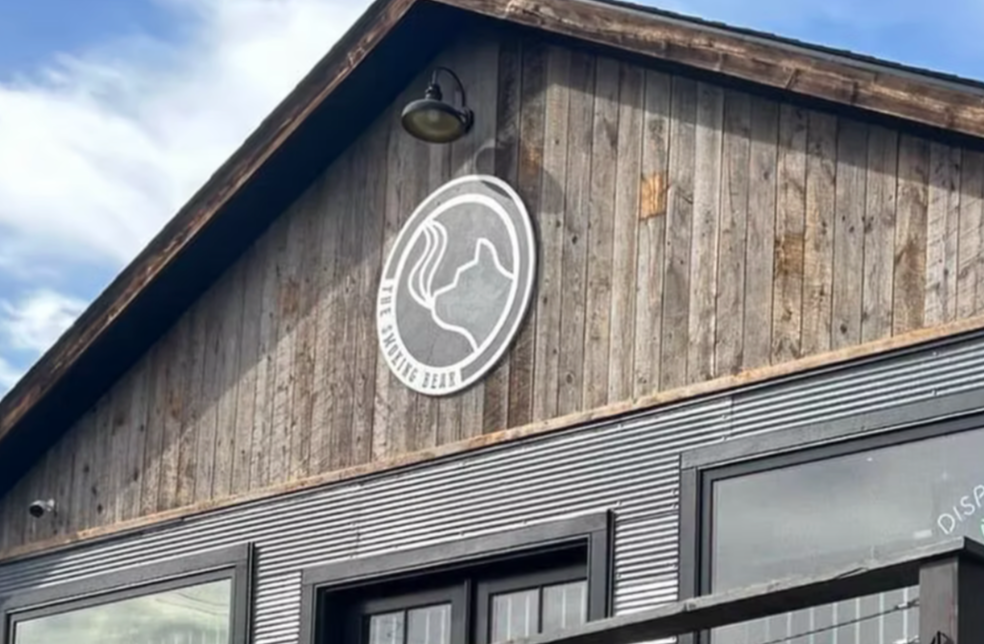The Smoking Bear. Logo Design and Handpainted Sign; Gardiner Montana